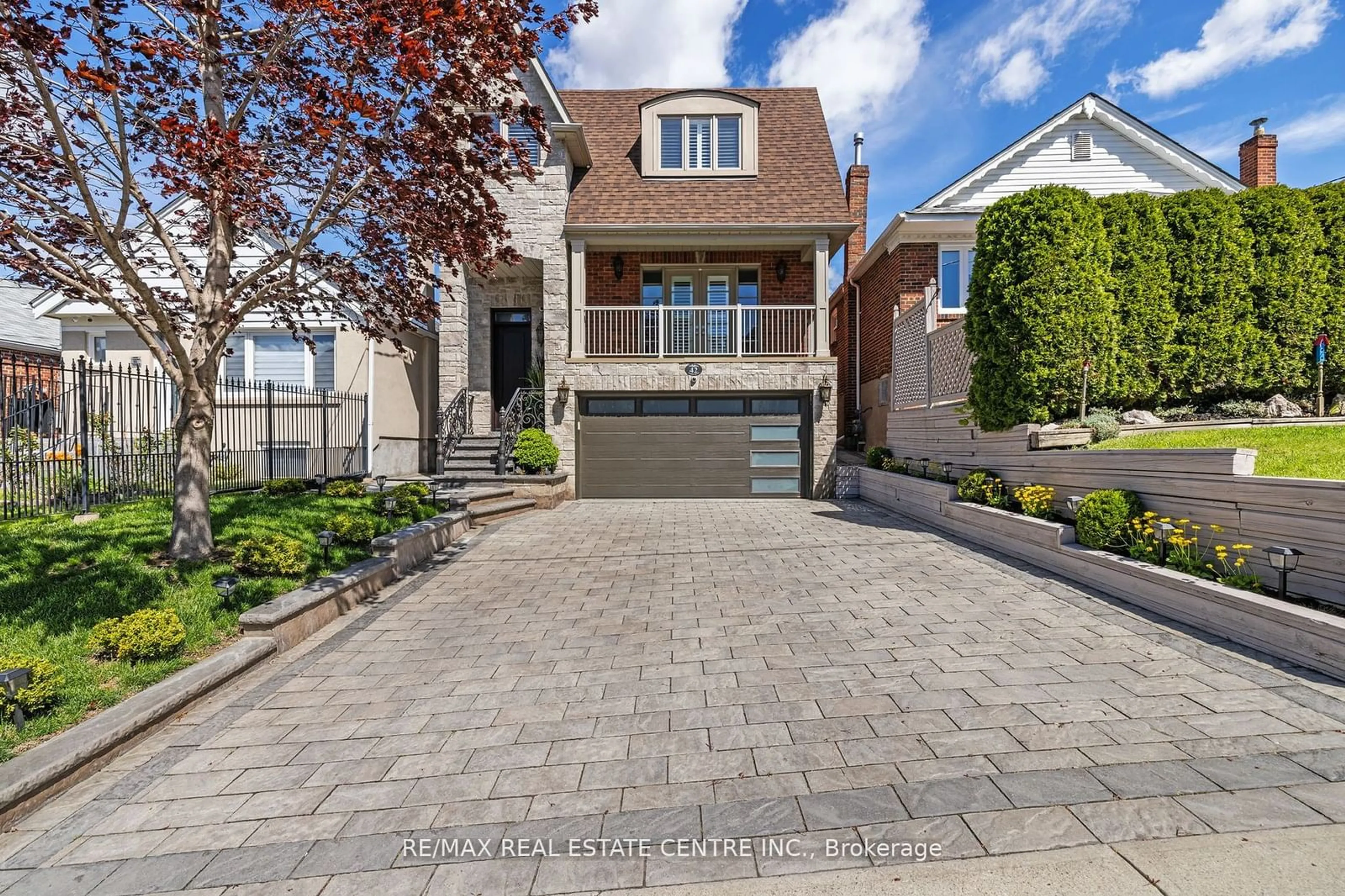 Home with brick exterior material for 42 Ypres Rd, Toronto Ontario M6M 1N9