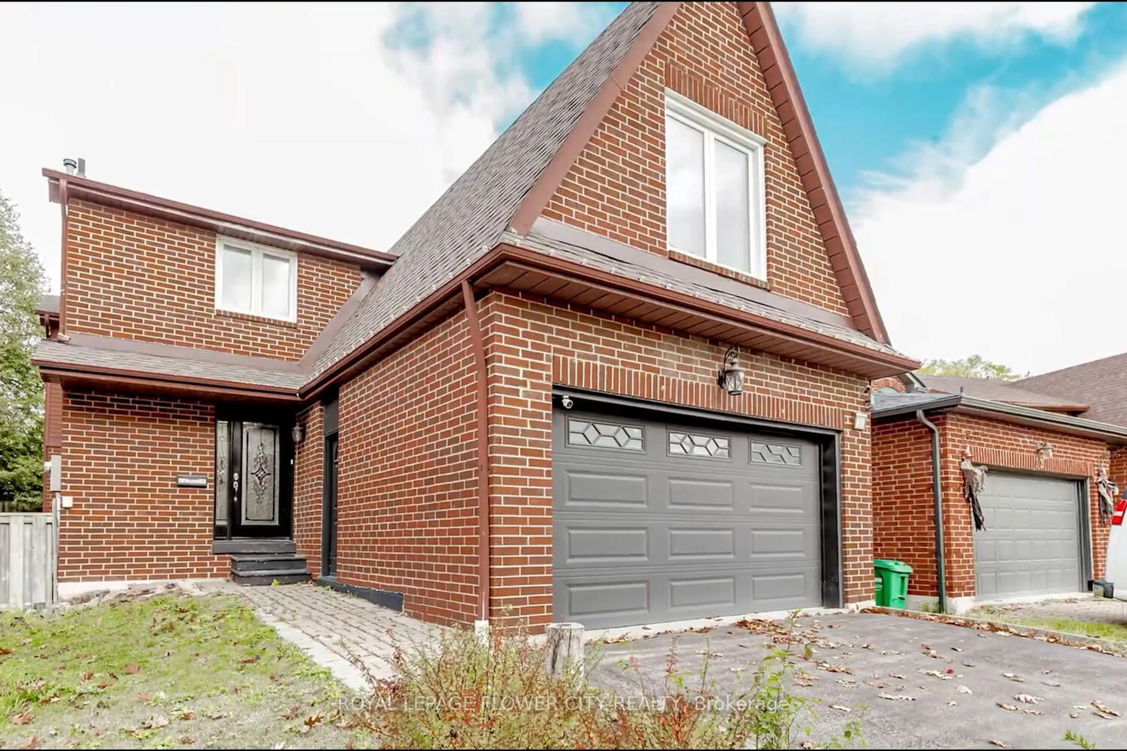 Home with brick exterior material for 14 Hallen Rd, Brampton Ontario L6Y 0V6