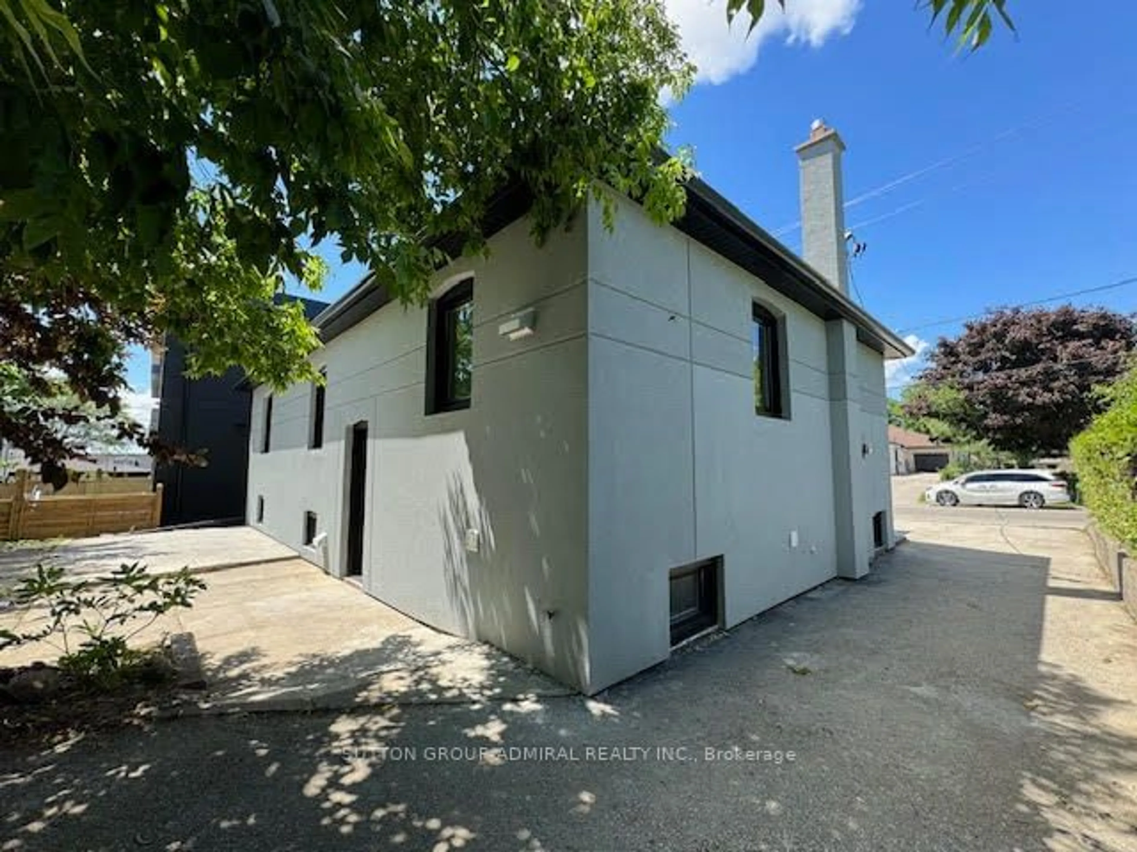 Frontside or backside of a home for 233 Falstaff Ave, Toronto Ontario M6L 2G2