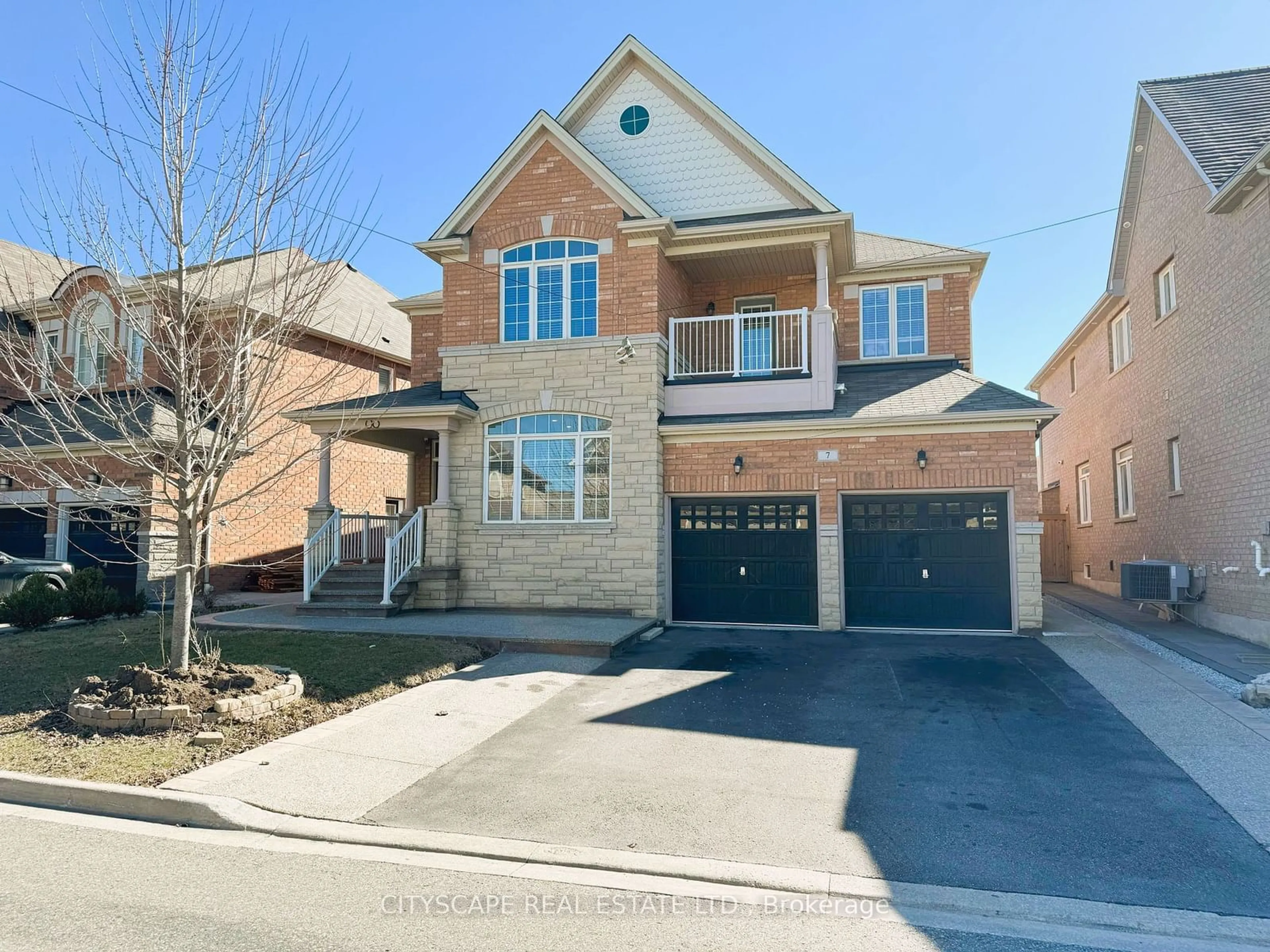 Frontside or backside of a home, the street view for 7 Attraction Dr, Brampton Ontario L6Y 2Z8