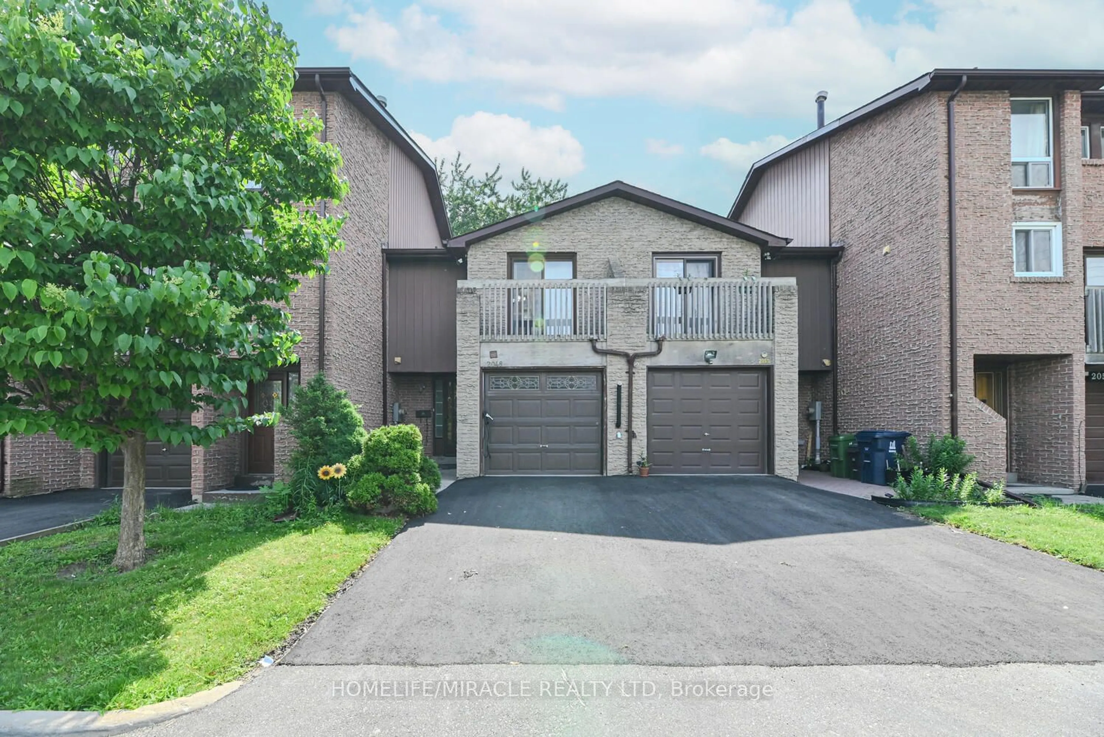 A pic from exterior of the house or condo for 2048 Martin Grove Rd, Toronto Ontario M9V 4B6