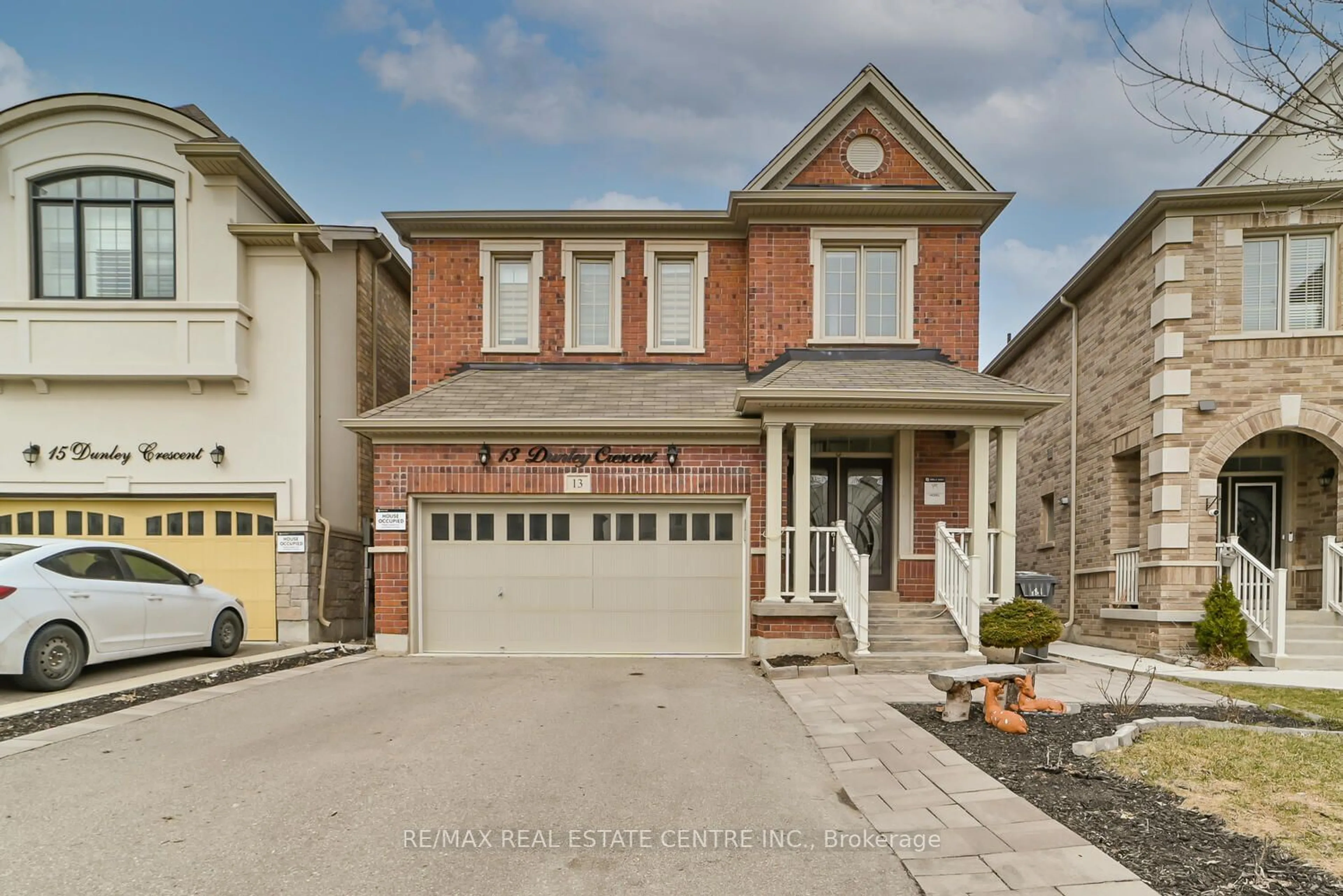 Home with brick exterior material for 13 Dunley Cres, Brampton Ontario L6X 5K3