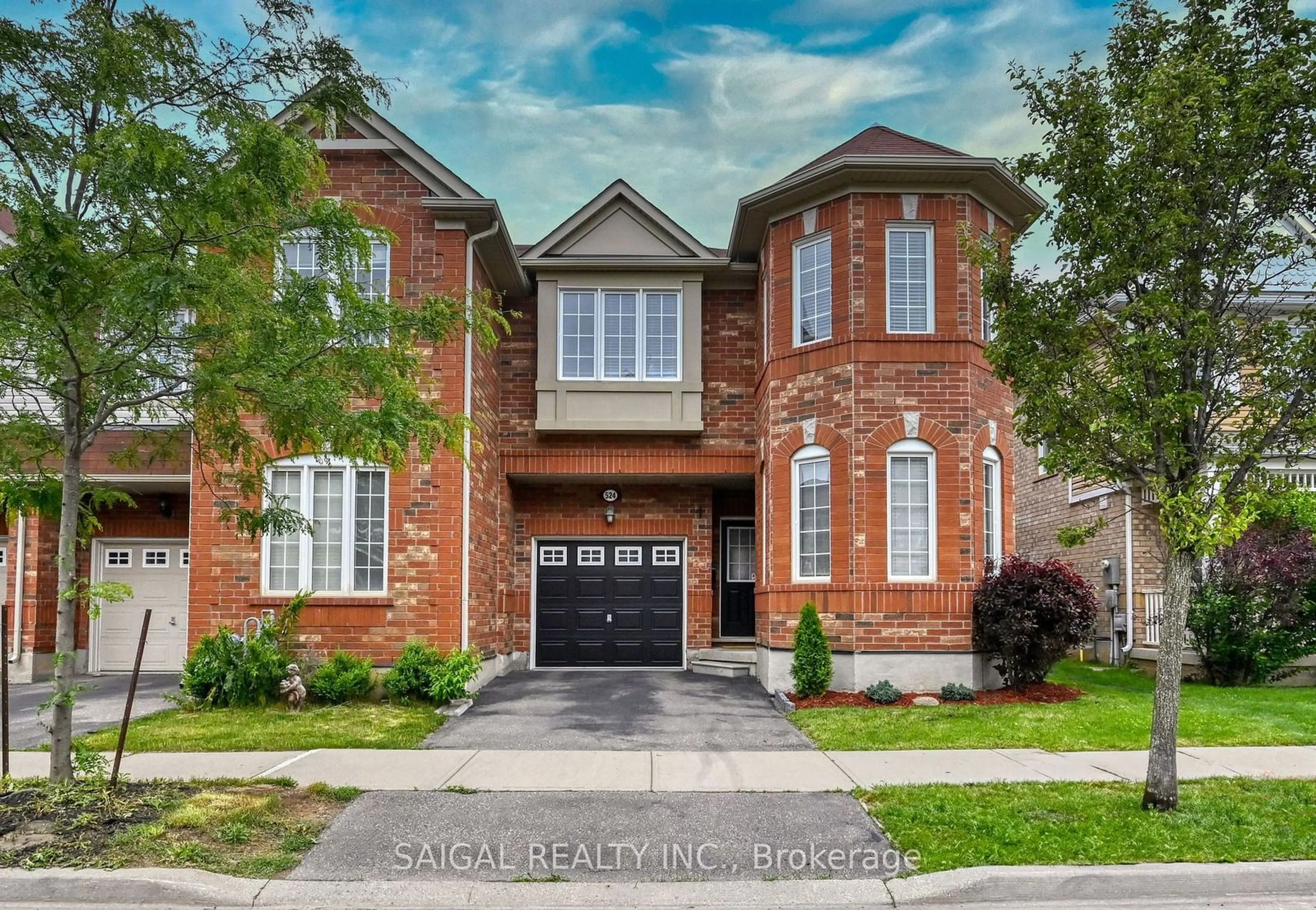 Home with brick exterior material for 524 Cavanagh Lane, Milton Ontario L9T 8B9