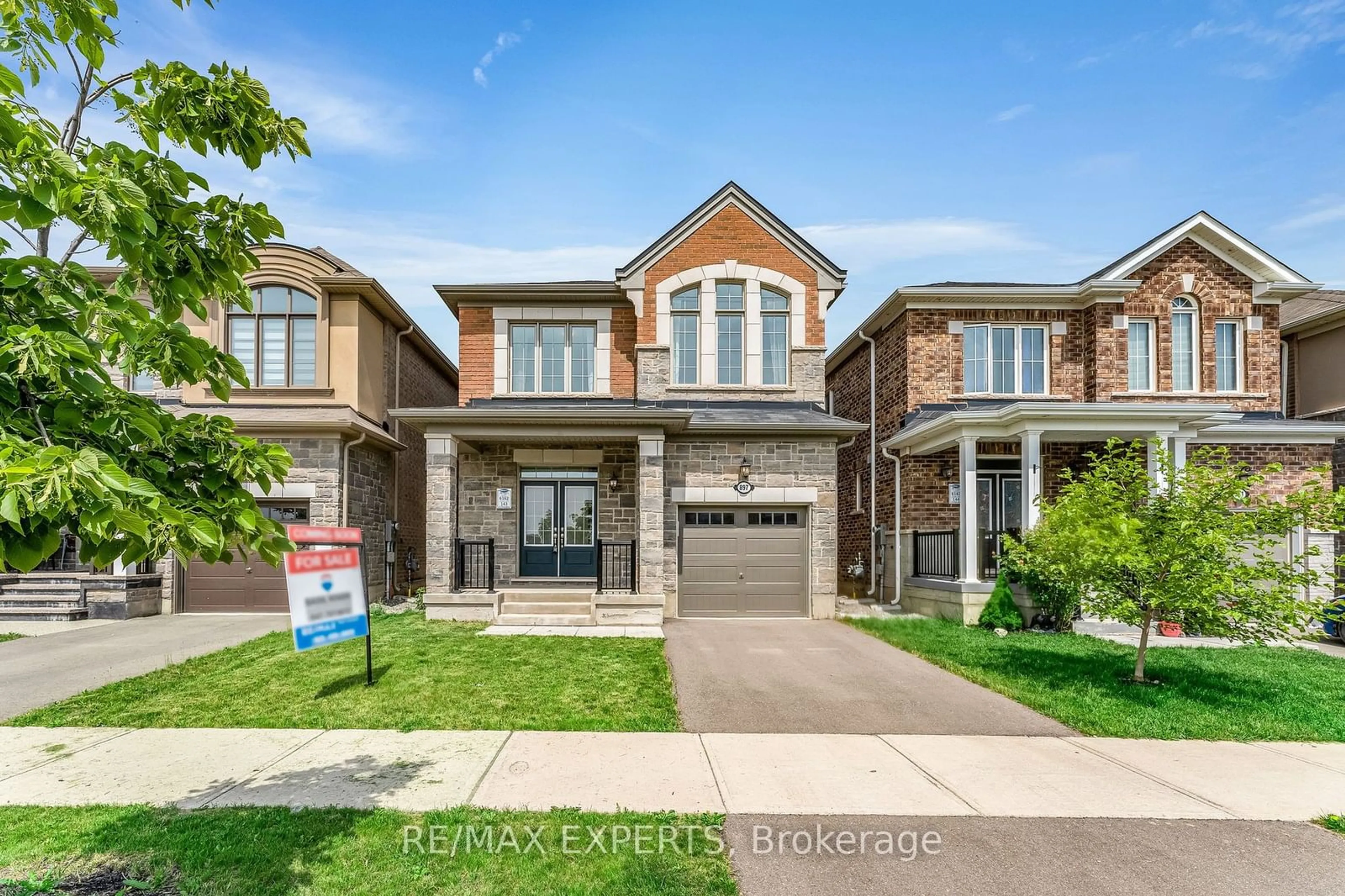 Frontside or backside of a home for 897 Whitlock Ave, Milton Ontario L9E 1R7