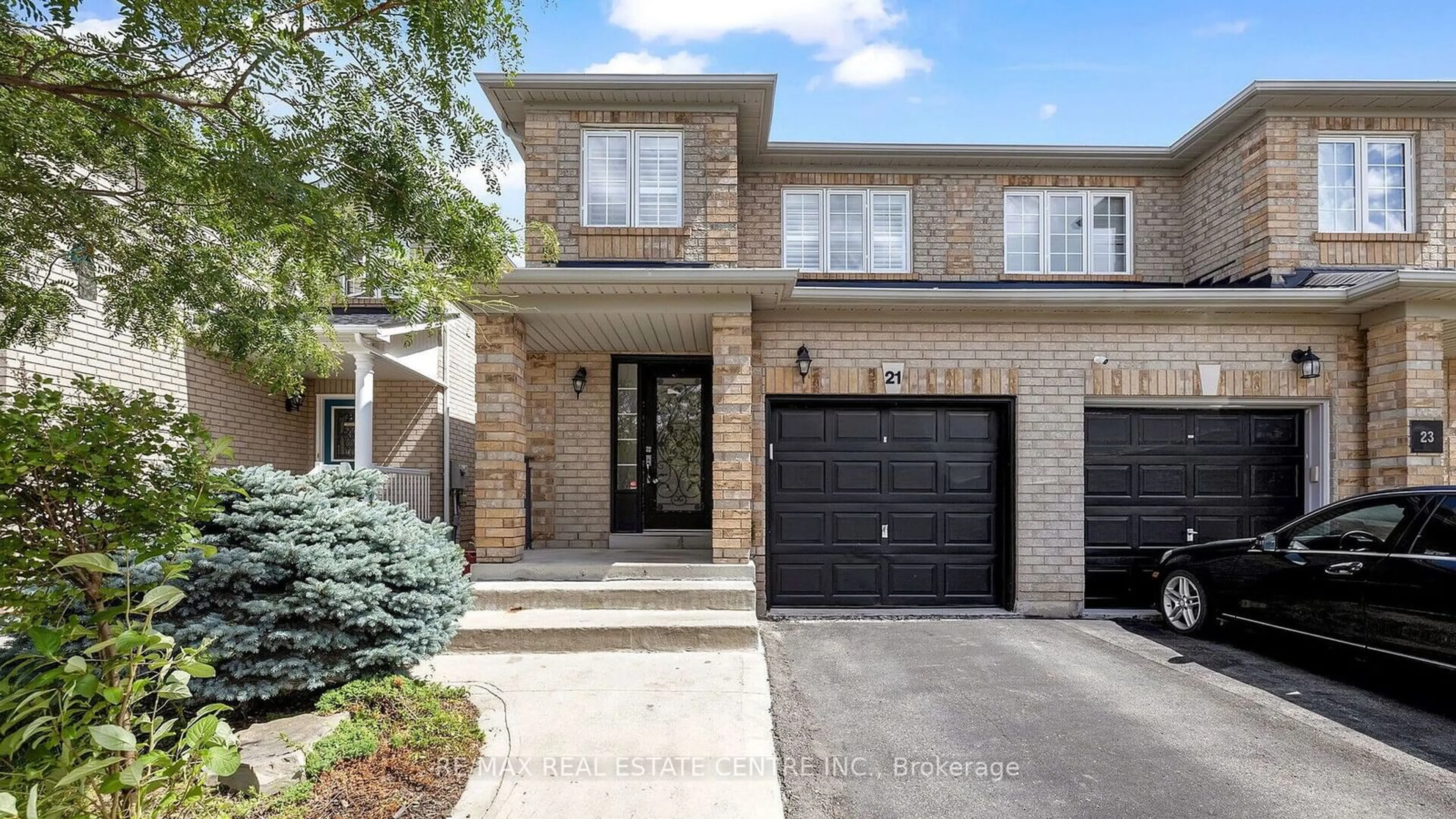 Home with brick exterior material for 21 Roadmaster Lane, Brampton Ontario L7A 3A9