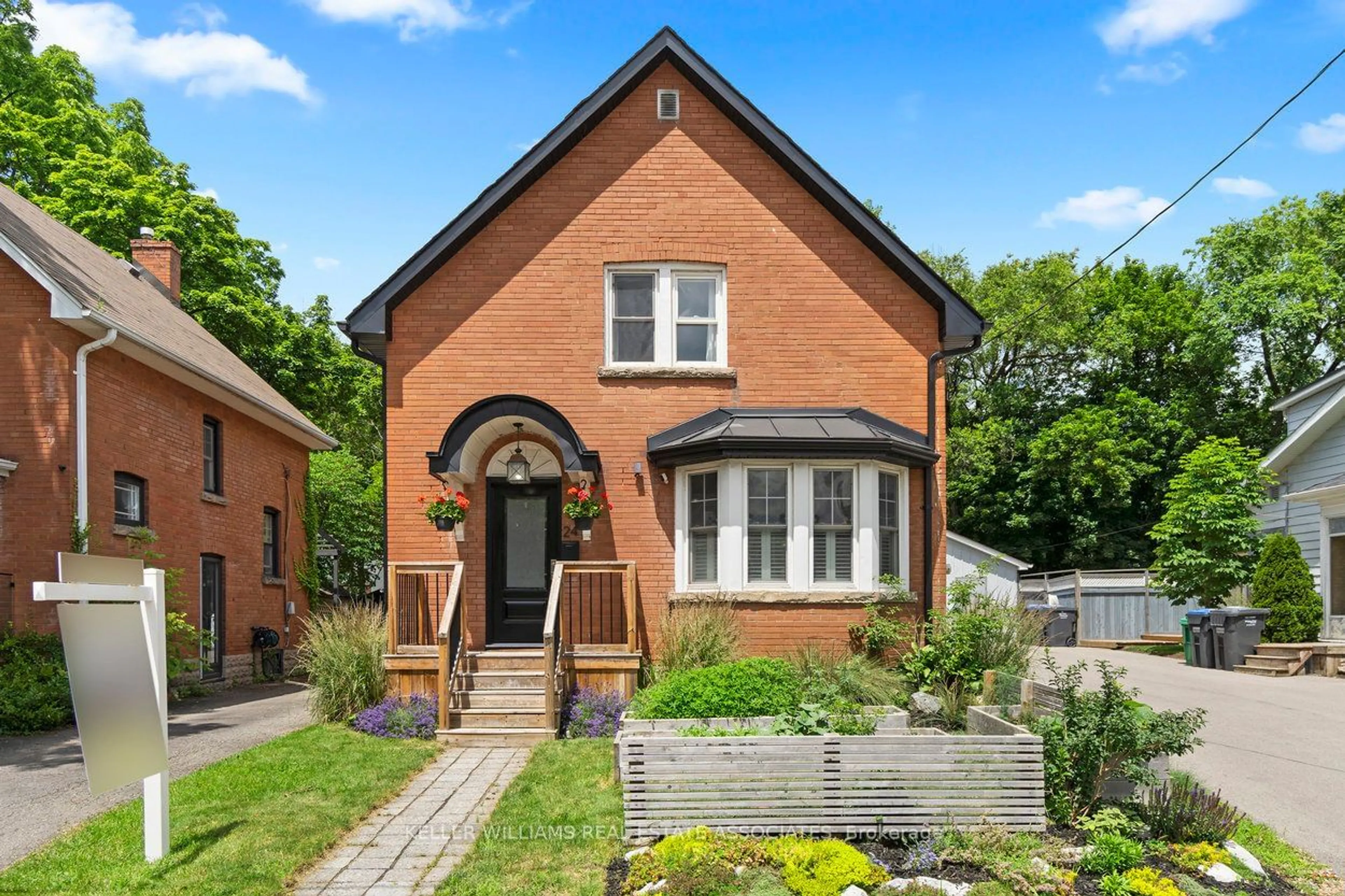 Home with brick exterior material for 24 Ellen St, Brampton Ontario L6V 1J6