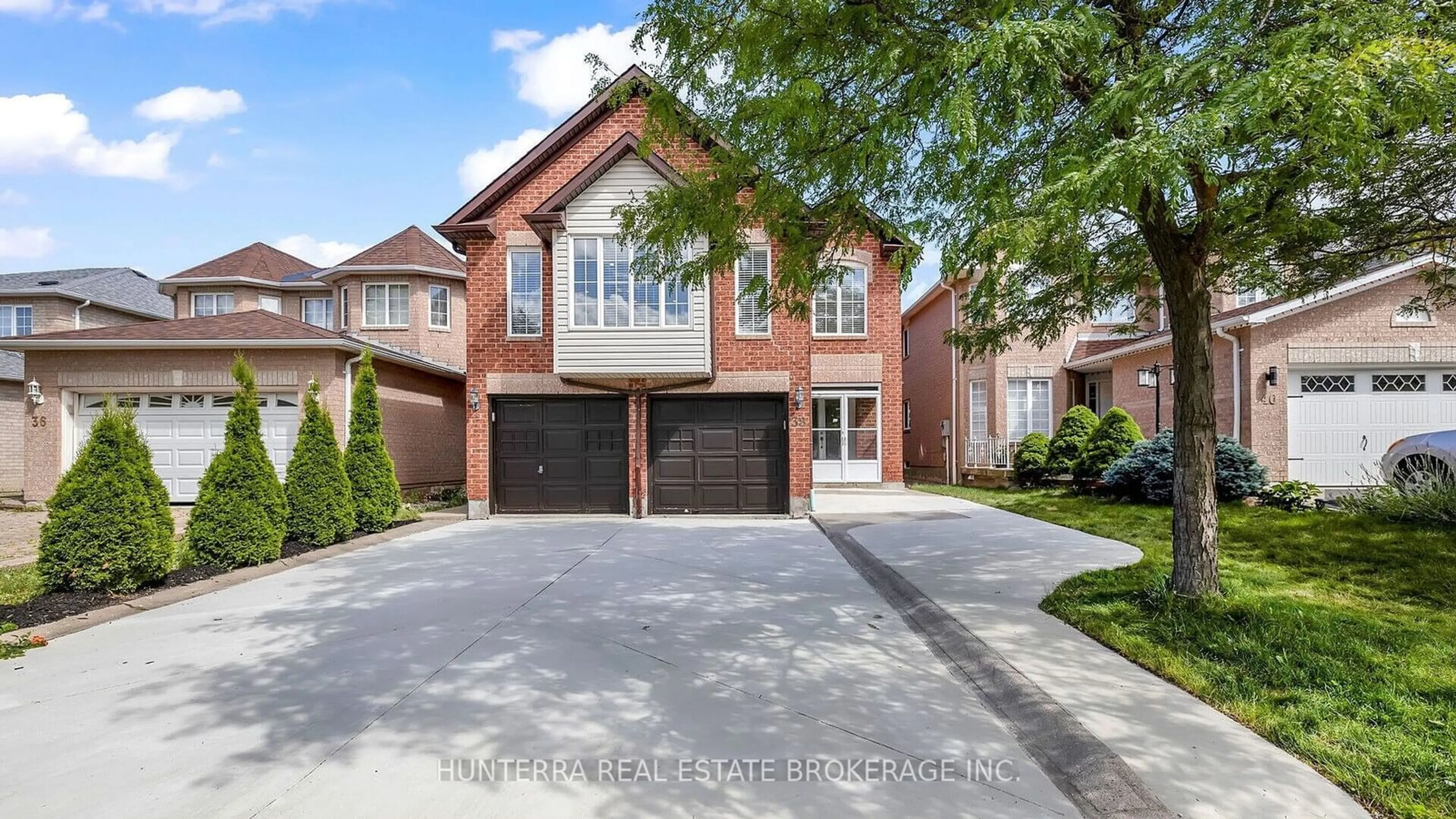 Home with brick exterior material for 38 Pebblestone Circ, Brampton Ontario L6X 4N2