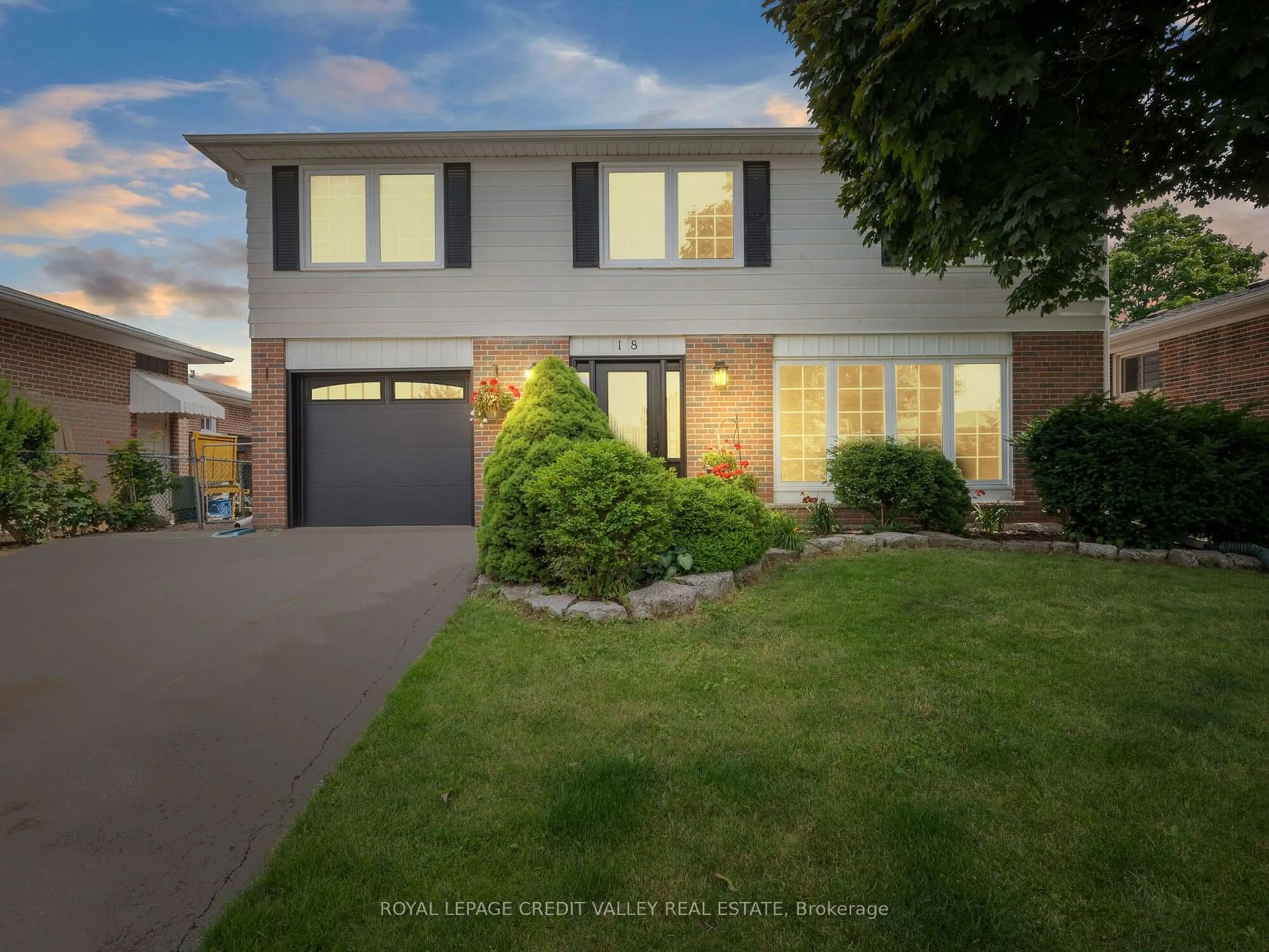 Frontside or backside of a home for 18 Terra Cotta Cres, Brampton Ontario L6W 1C1