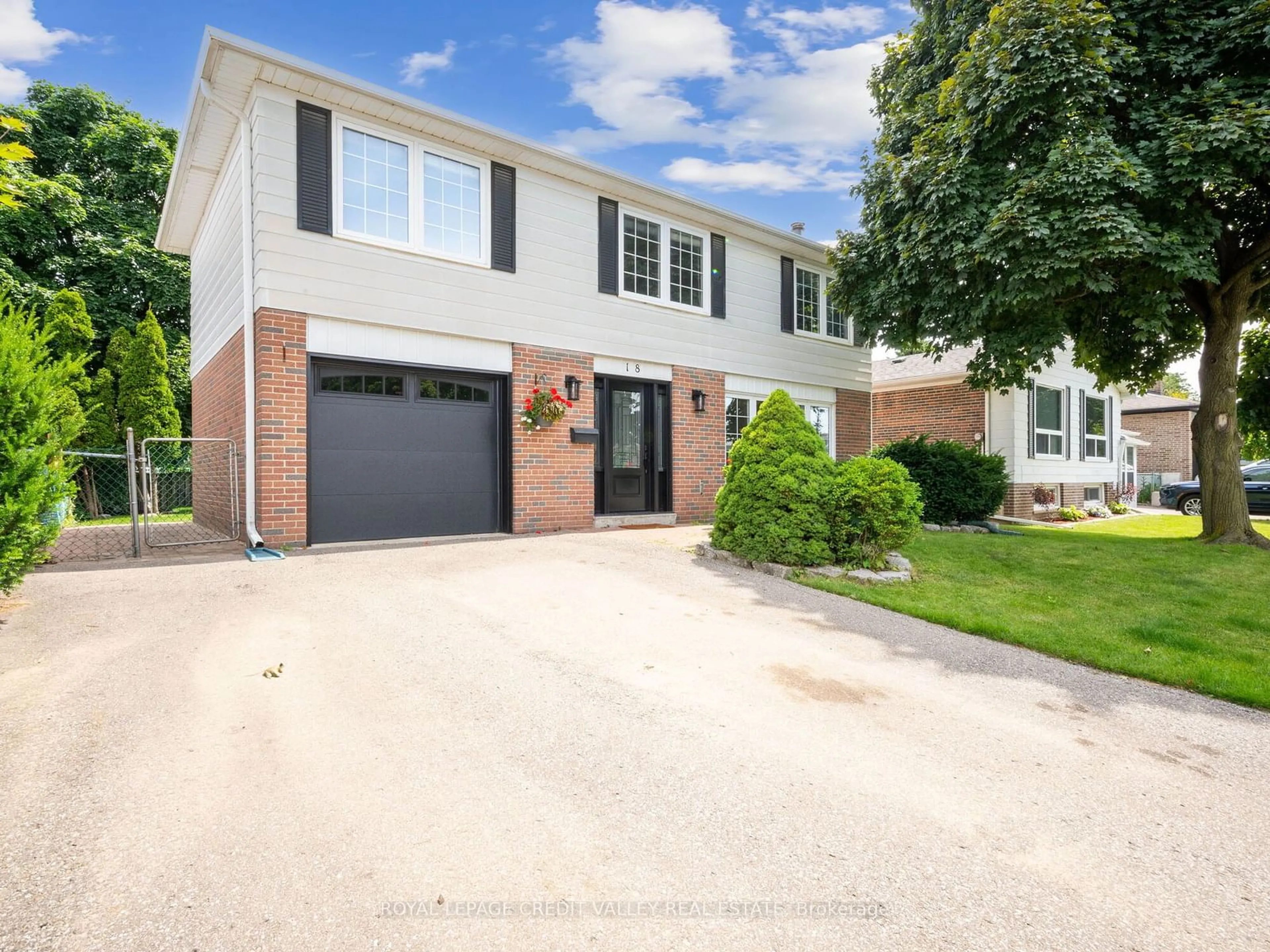 Frontside or backside of a home for 18 Terra Cotta Cres, Brampton Ontario L6W 1C1