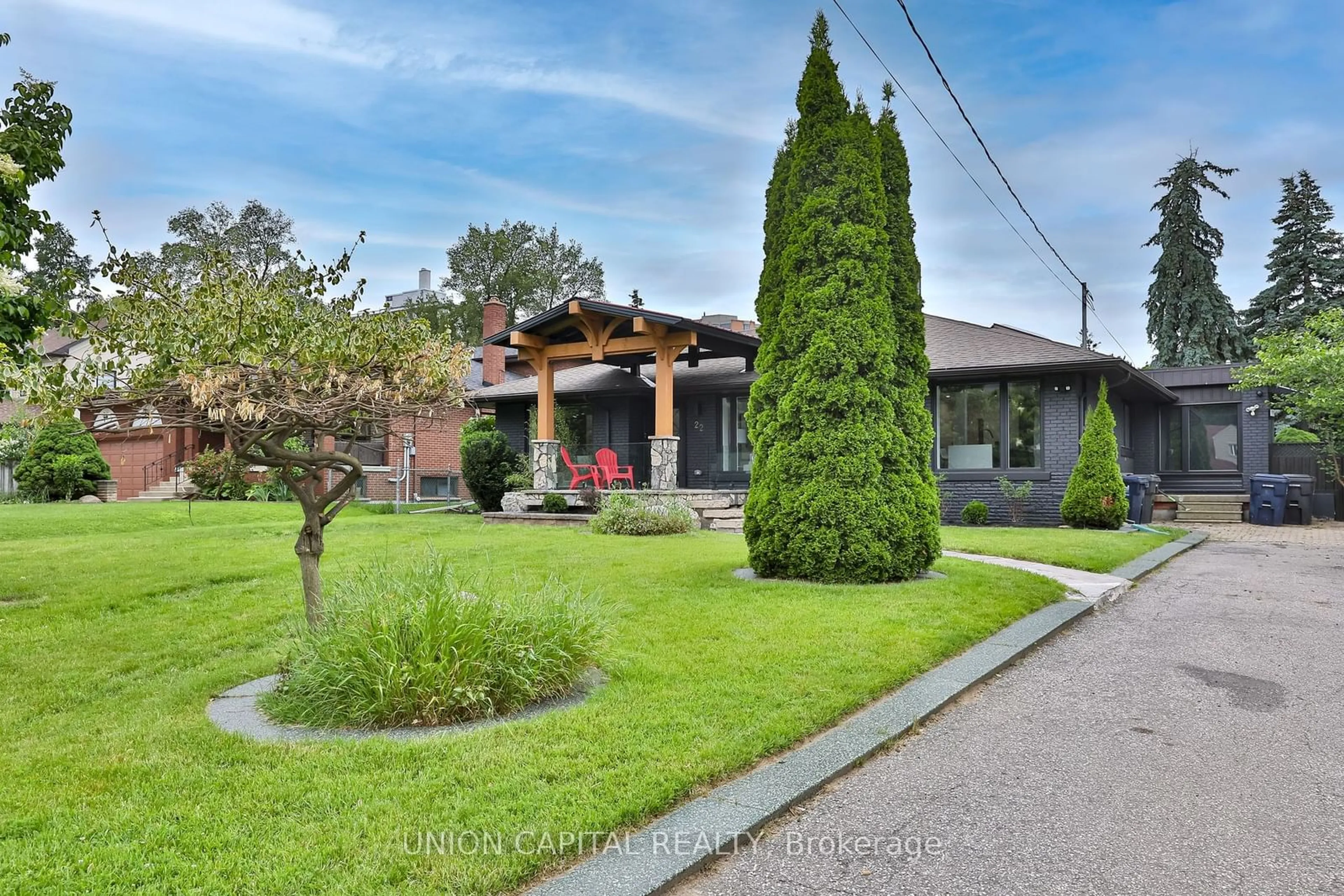 Frontside or backside of a home for 22 McArthur St, Toronto Ontario M8P 3M7