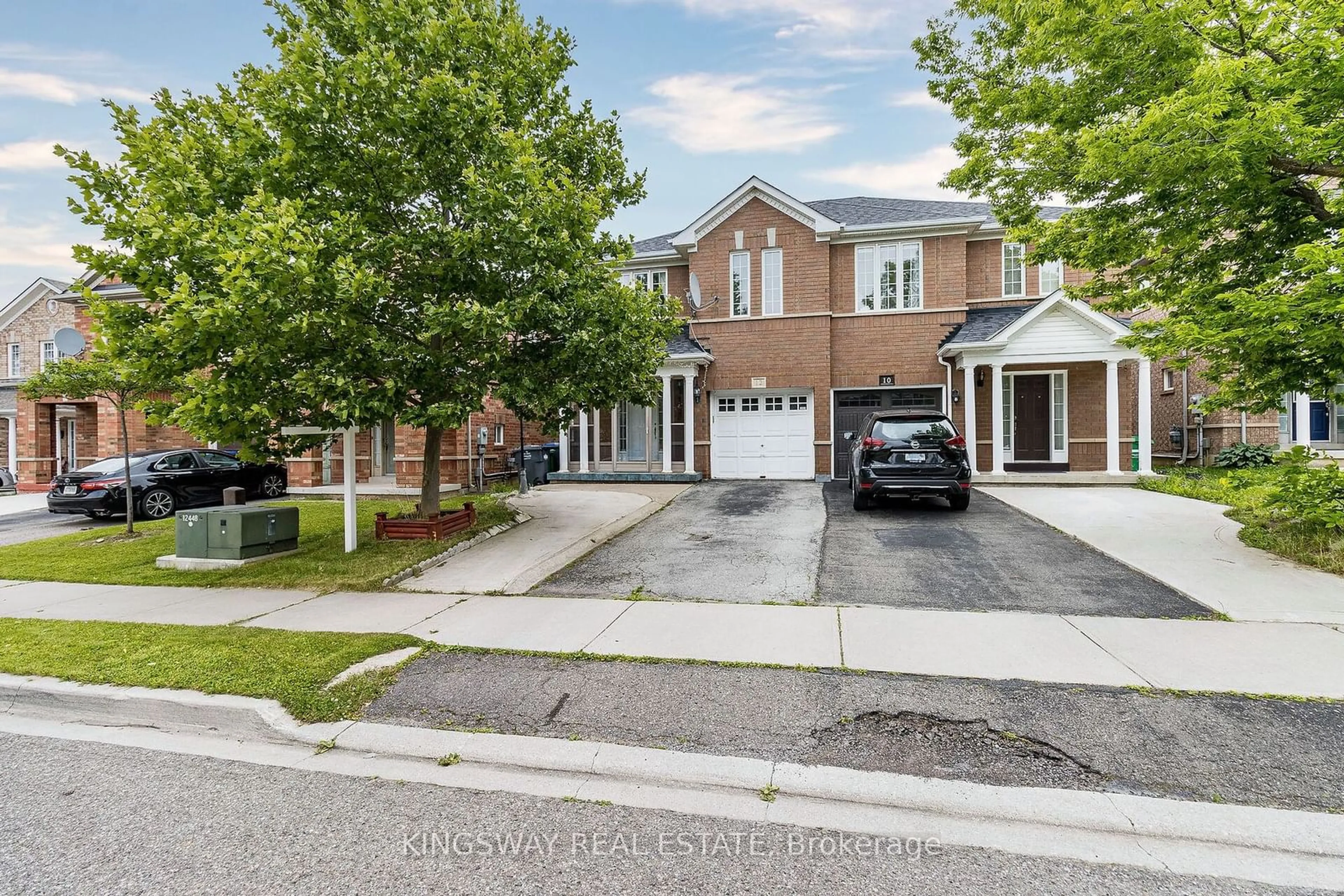 Home with brick exterior material for 12 Tanglemere Cres, Brampton Ontario L7A 1R7