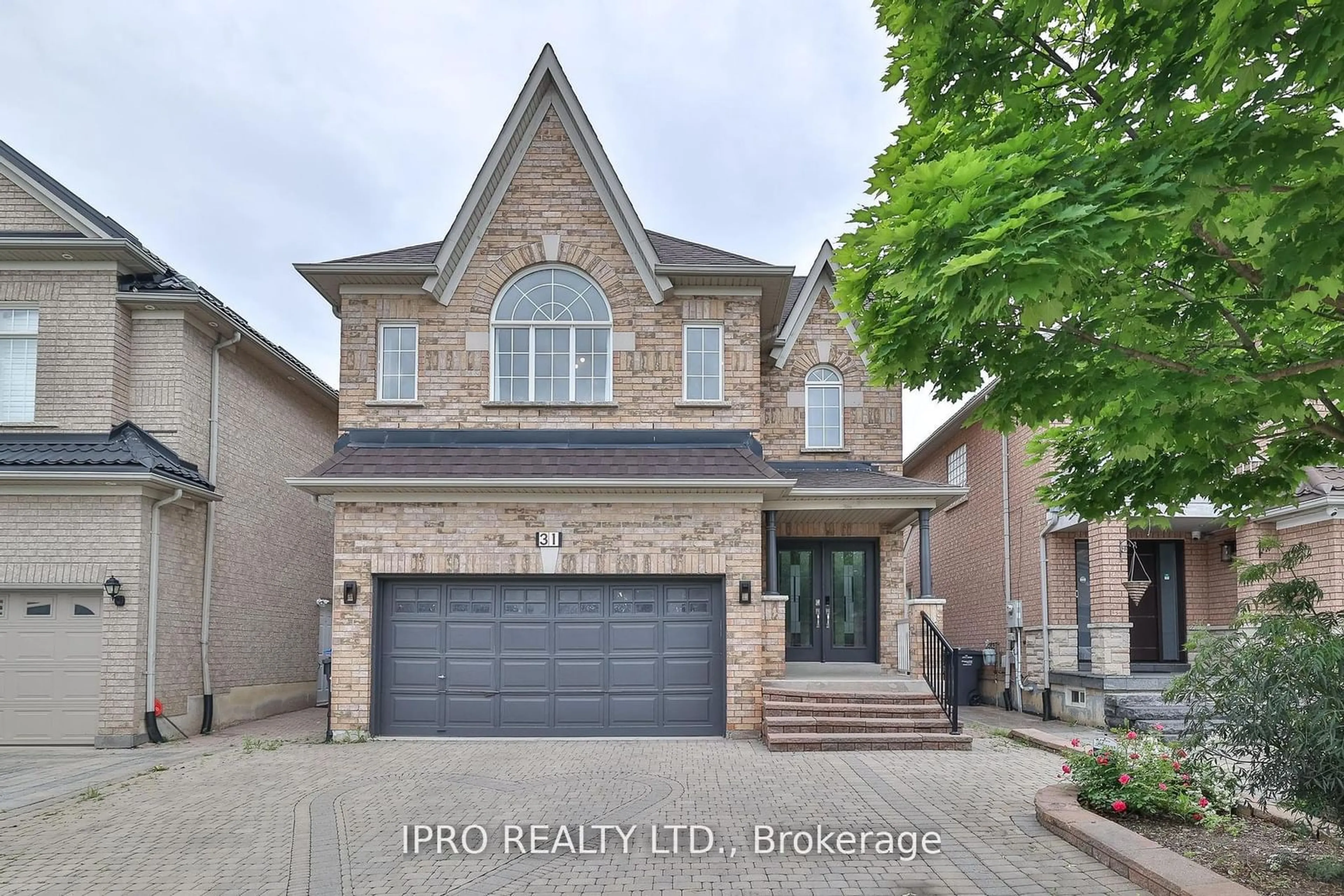 Home with brick exterior material for 31 Eastbrook Way, Brampton Ontario L6P 1K5