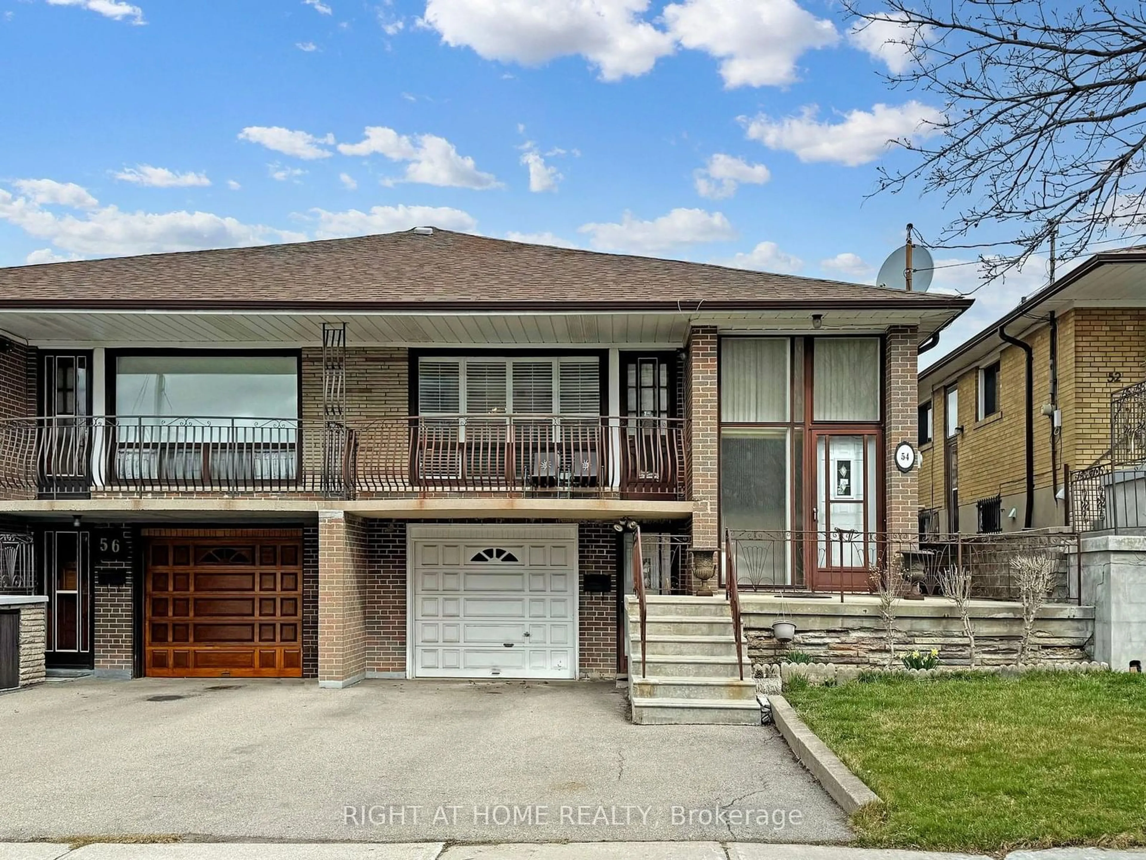 Frontside or backside of a home for 54 Wintergreen Rd, Toronto Ontario M3M 2J2