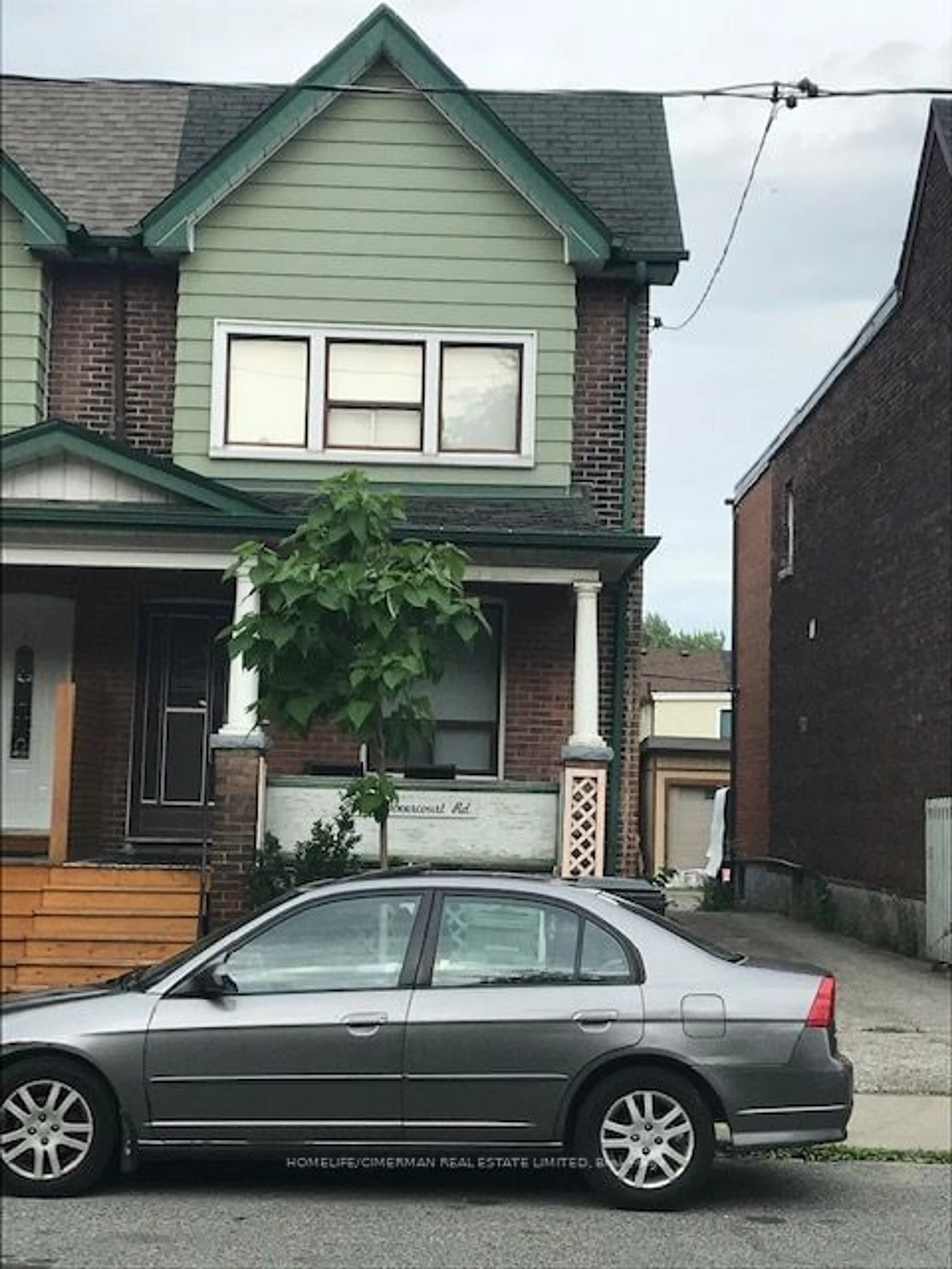 Frontside or backside of a home for 1031 Dovercourt Rd, Toronto Ontario M6H 2X7