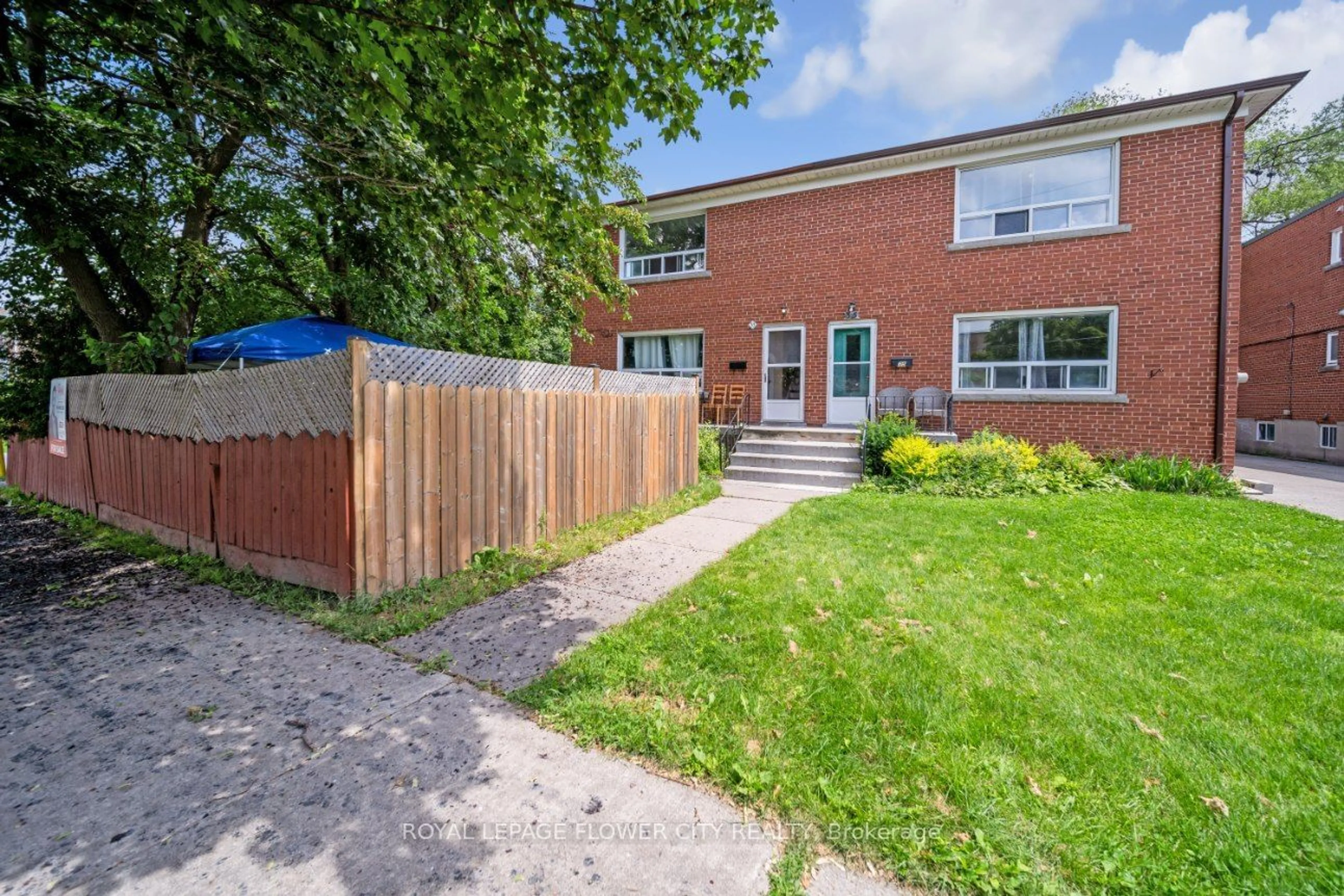 Home with brick exterior material for 33 Morgan Ave, Toronto Ontario M8Y 2Z9