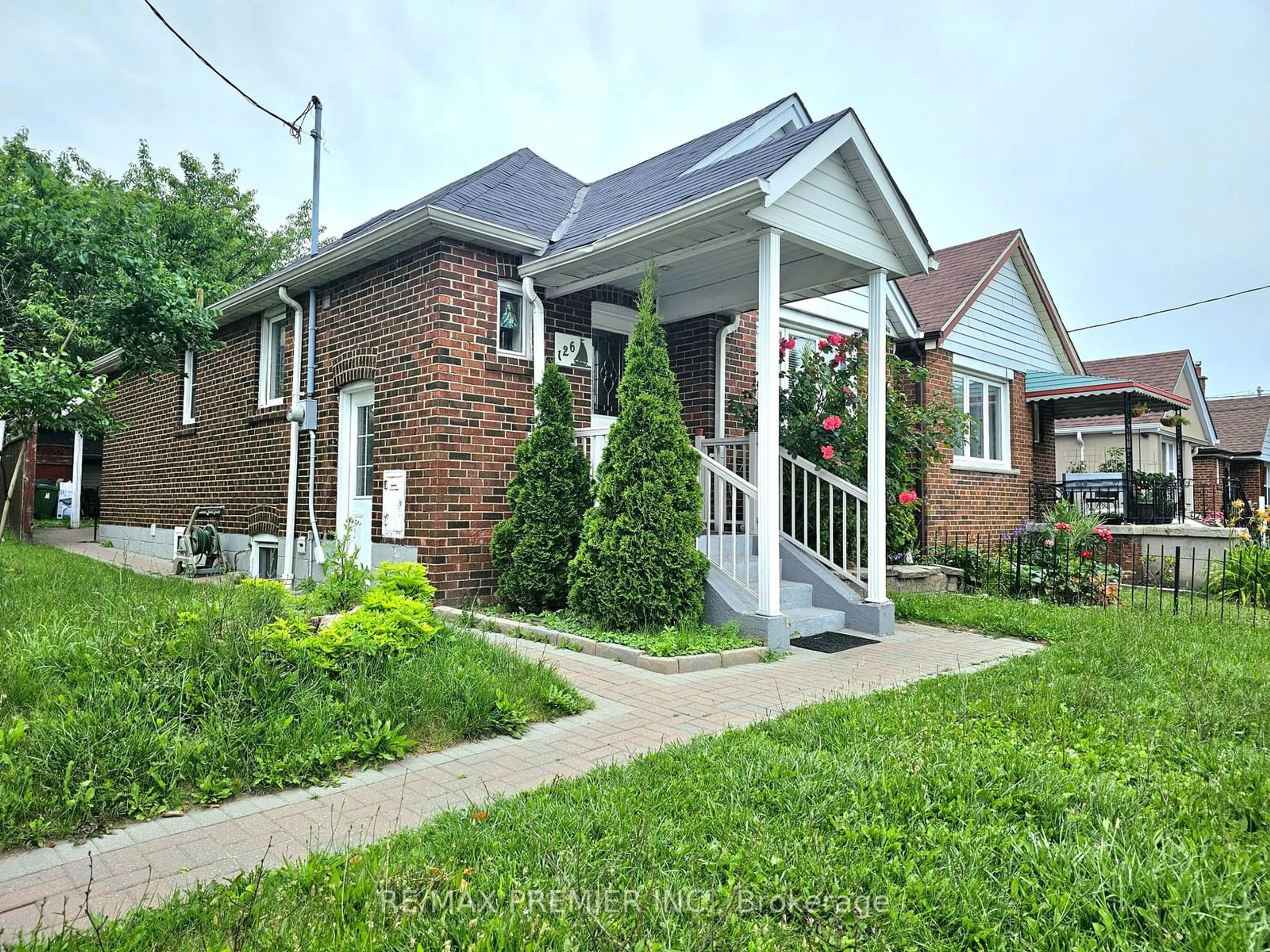 Frontside or backside of a home for 126 Times Rd, Toronto Ontario M6B 3M2
