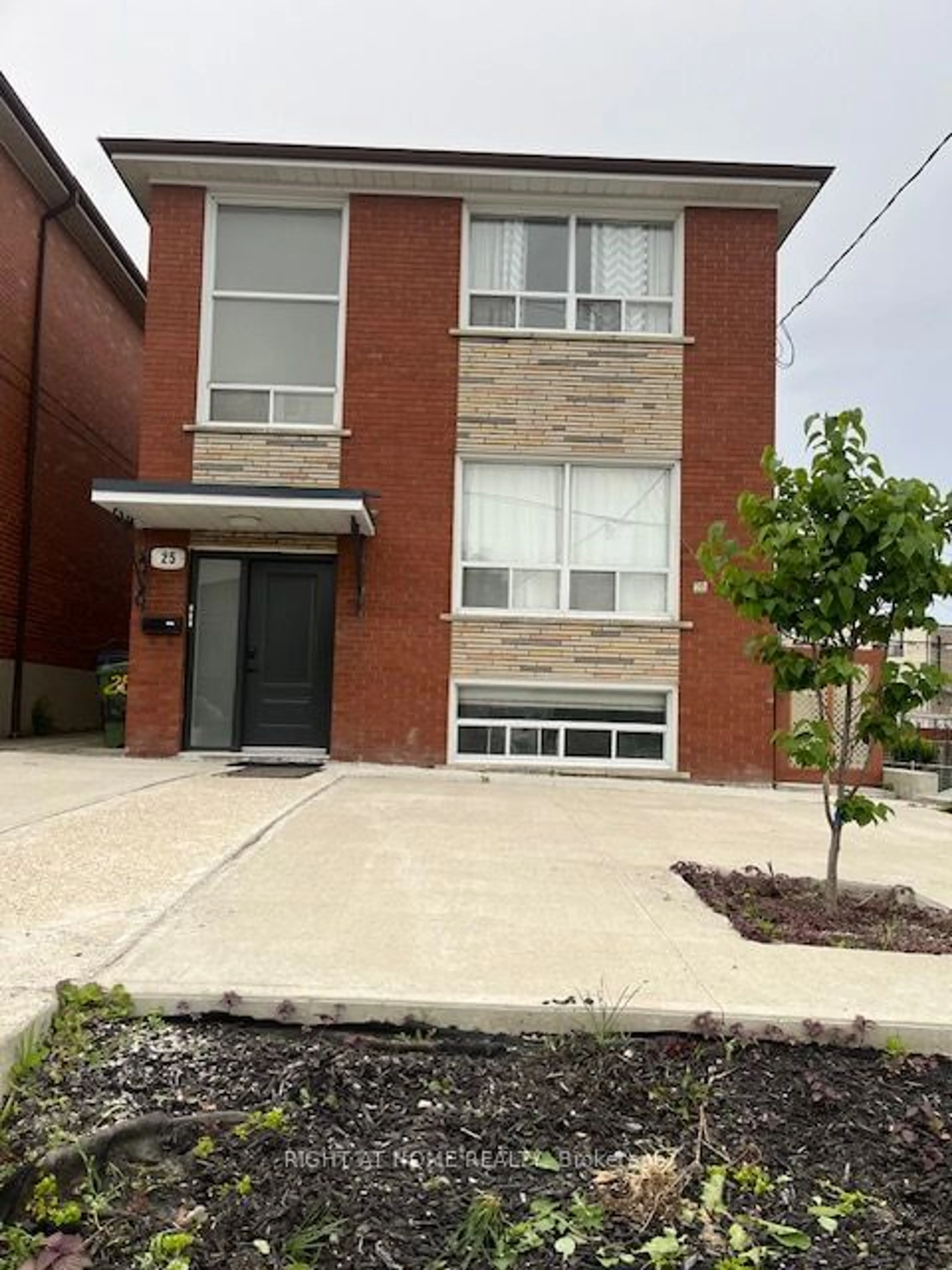 Home with brick exterior material for 25 Lester Ave, Toronto Ontario M6M 1V9