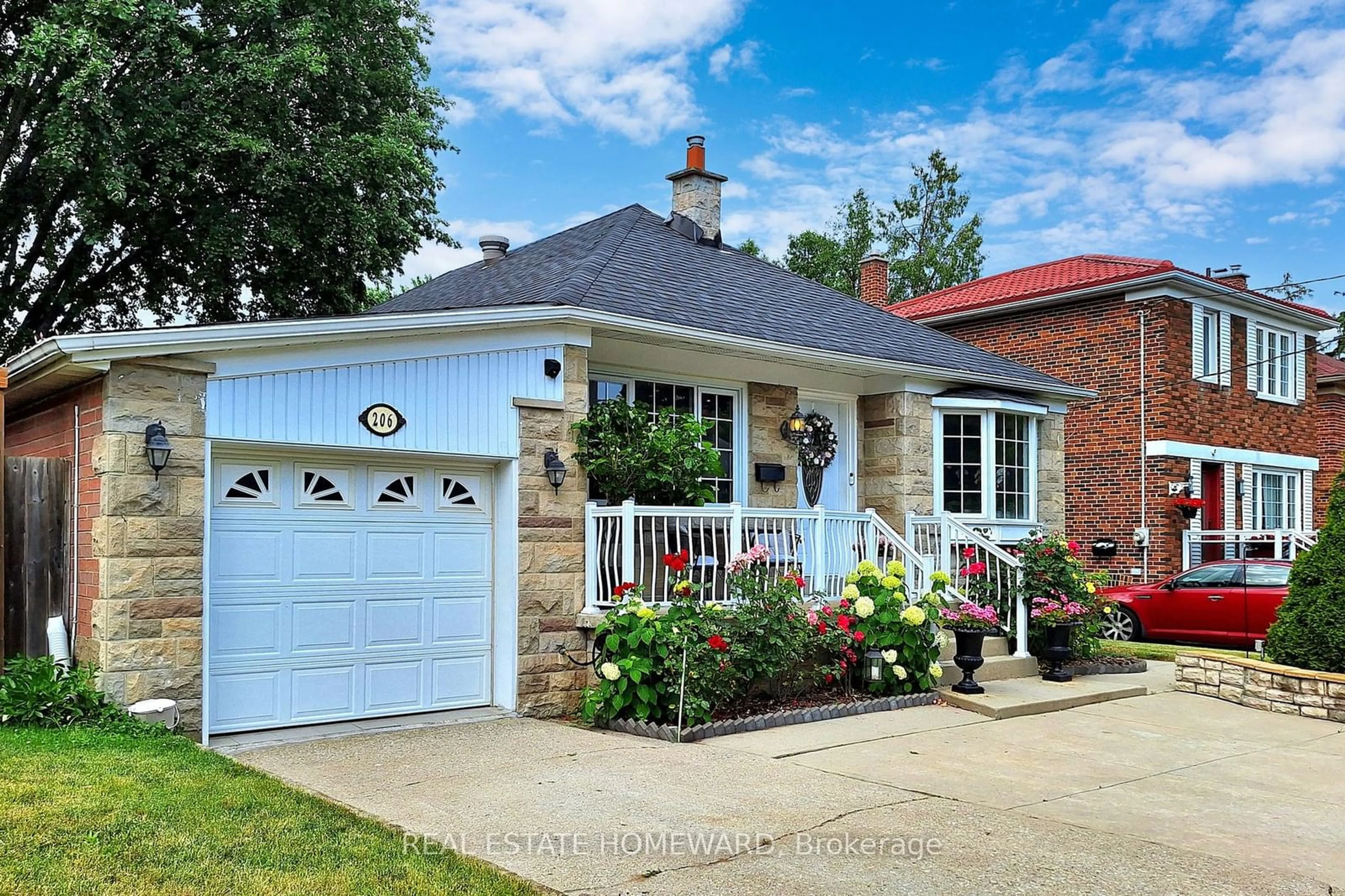 Home with brick exterior material for 206 King St, Toronto Ontario M9N 1L7