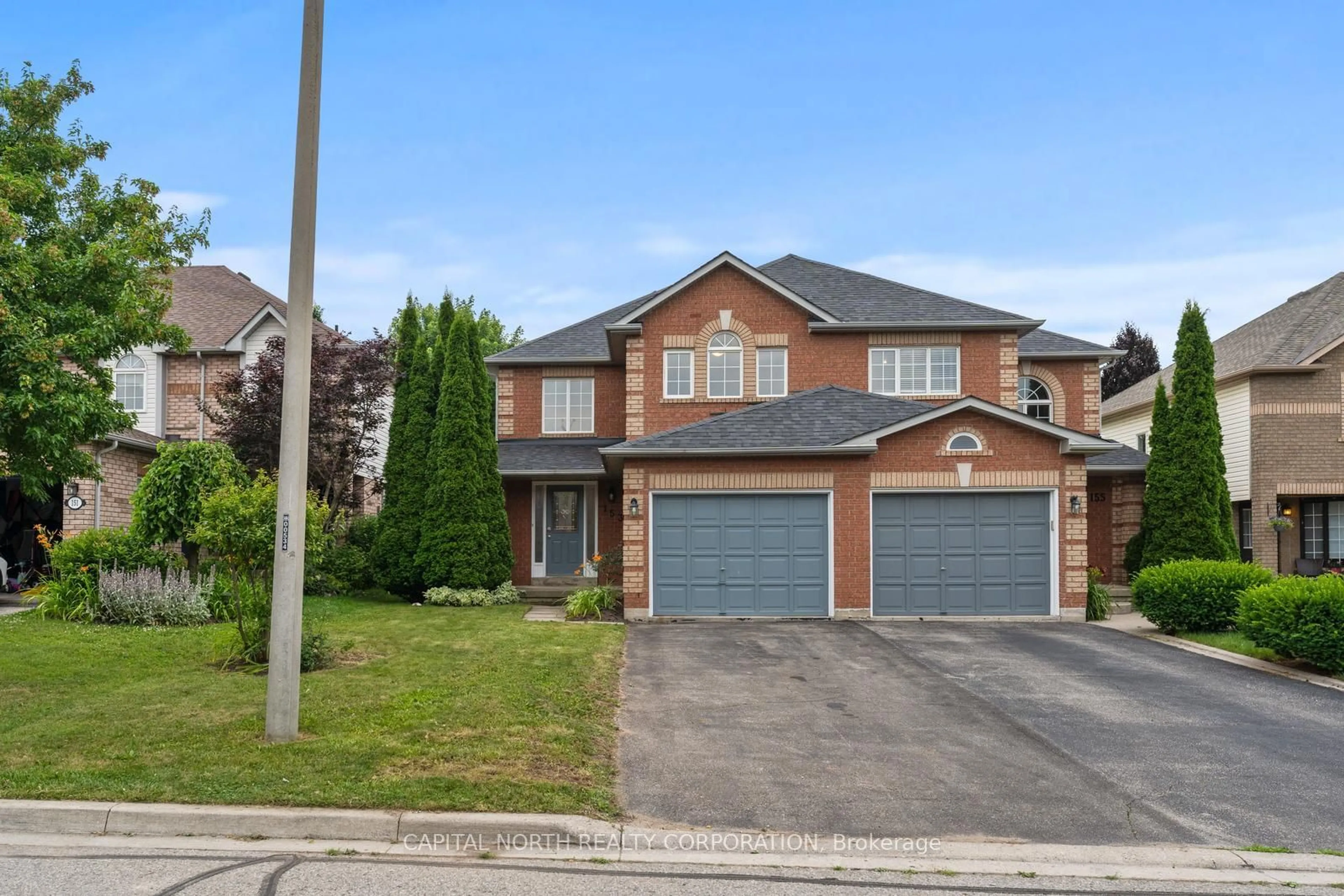 Frontside or backside of a home for 153 Mowat Cres, Halton Hills Ontario L7G 6C7