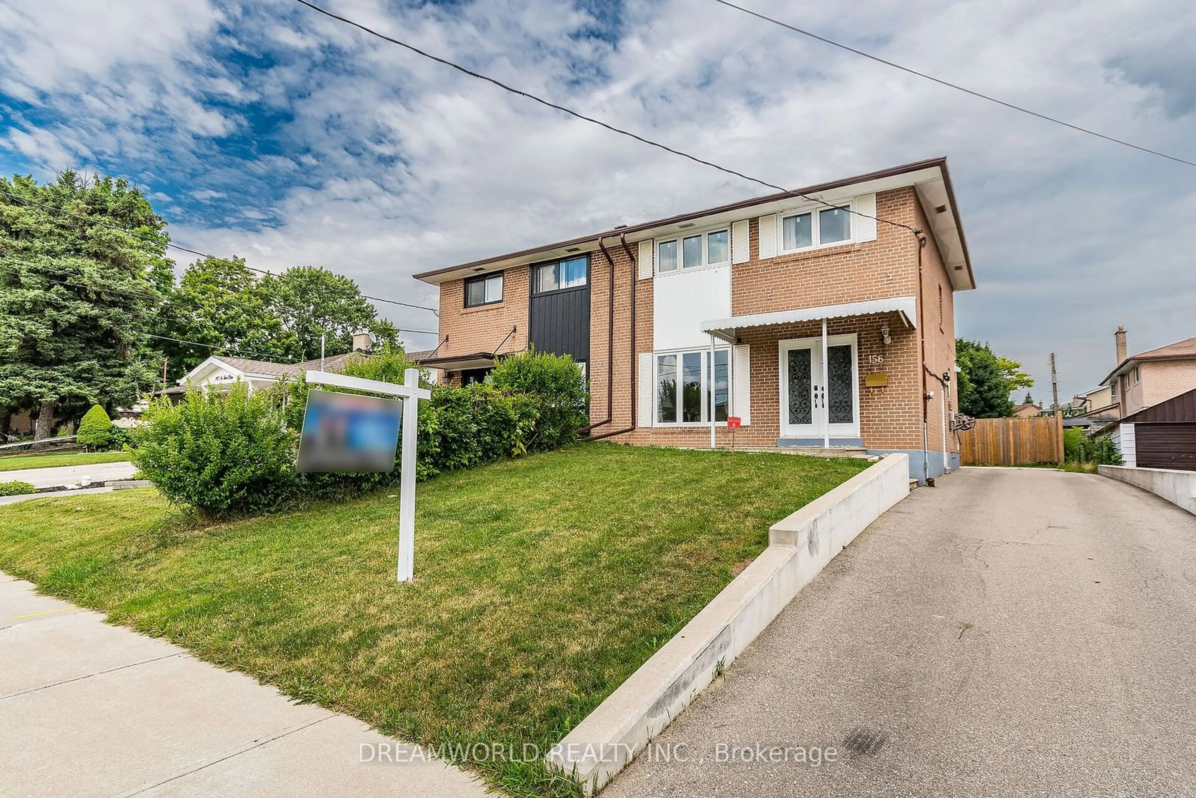Frontside or backside of a home for 156 St Lucie Dr, Toronto Ontario M9M 1T5