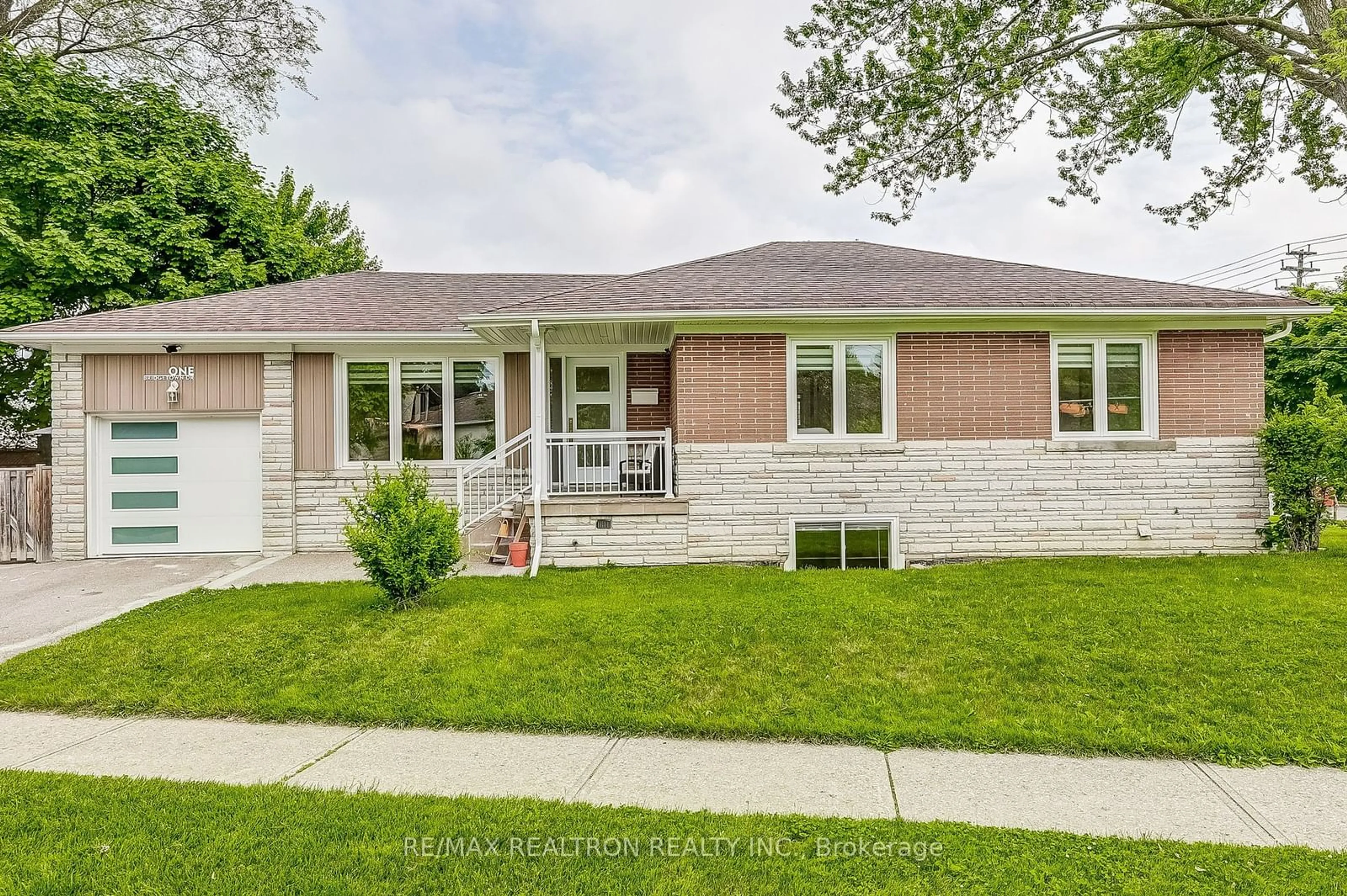 Frontside or backside of a home for 1 Bridgetown Dr, Toronto Ontario M9C 2P3