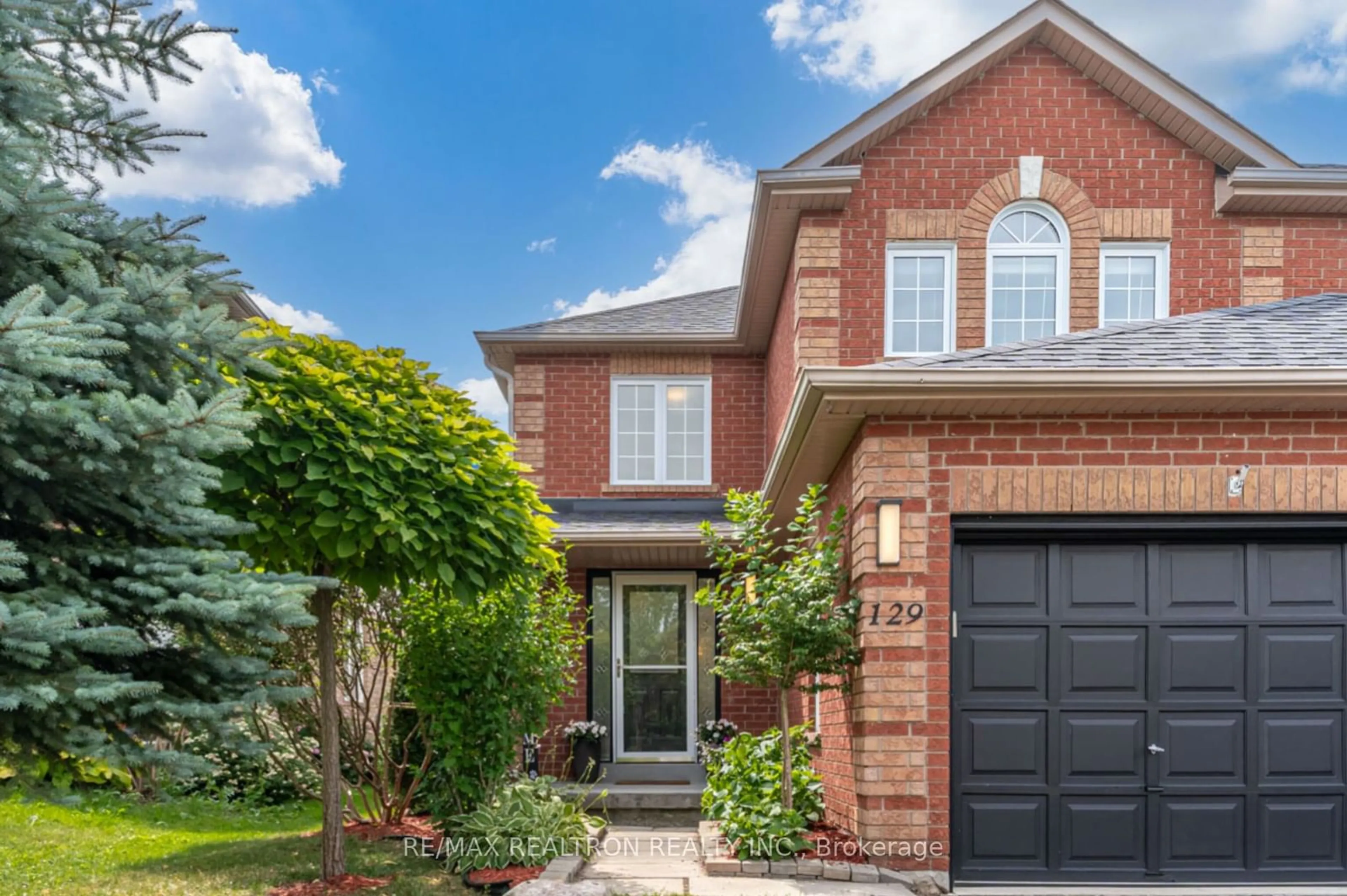 Home with brick exterior material for 129 Mowat Cres, Halton Hills Ontario L7G 6C7