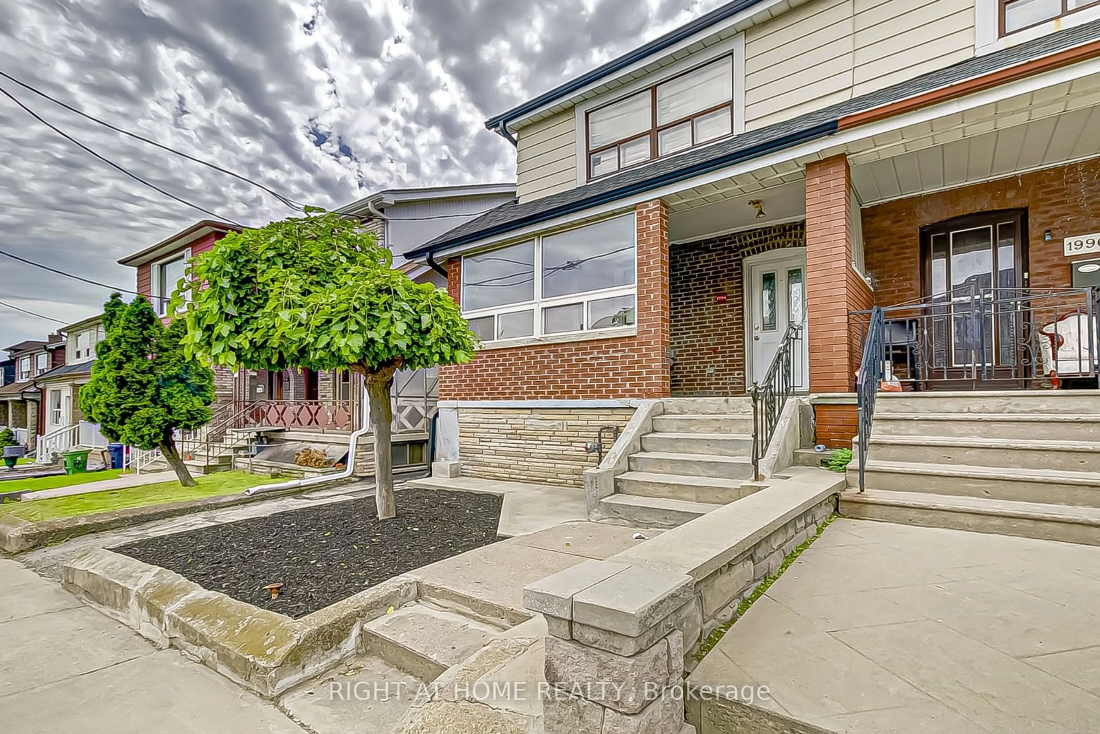 Home with brick exterior material for 1994 Dufferin St, Toronto Ontario M6E 3R2