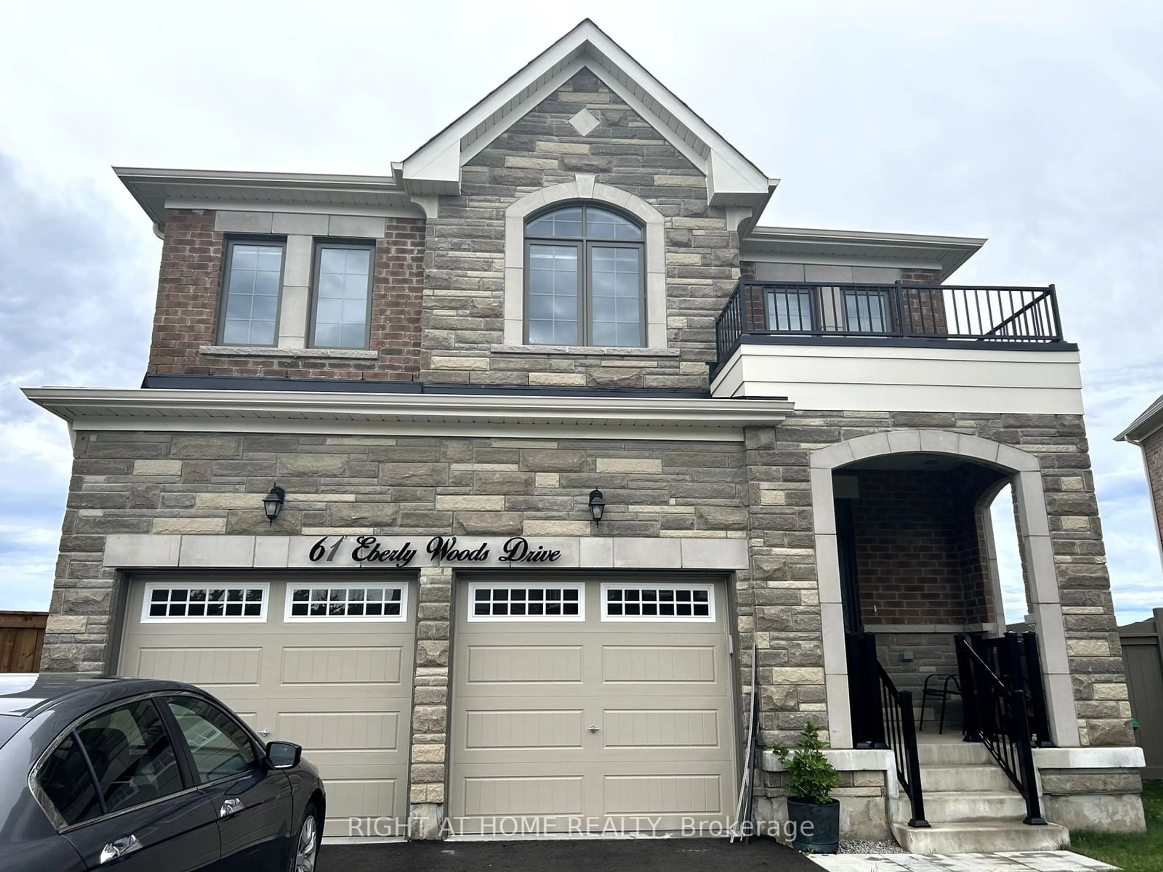 Home with brick exterior material for 61 Eberly Woods Dr, Caledon Ontario L7C 4J3