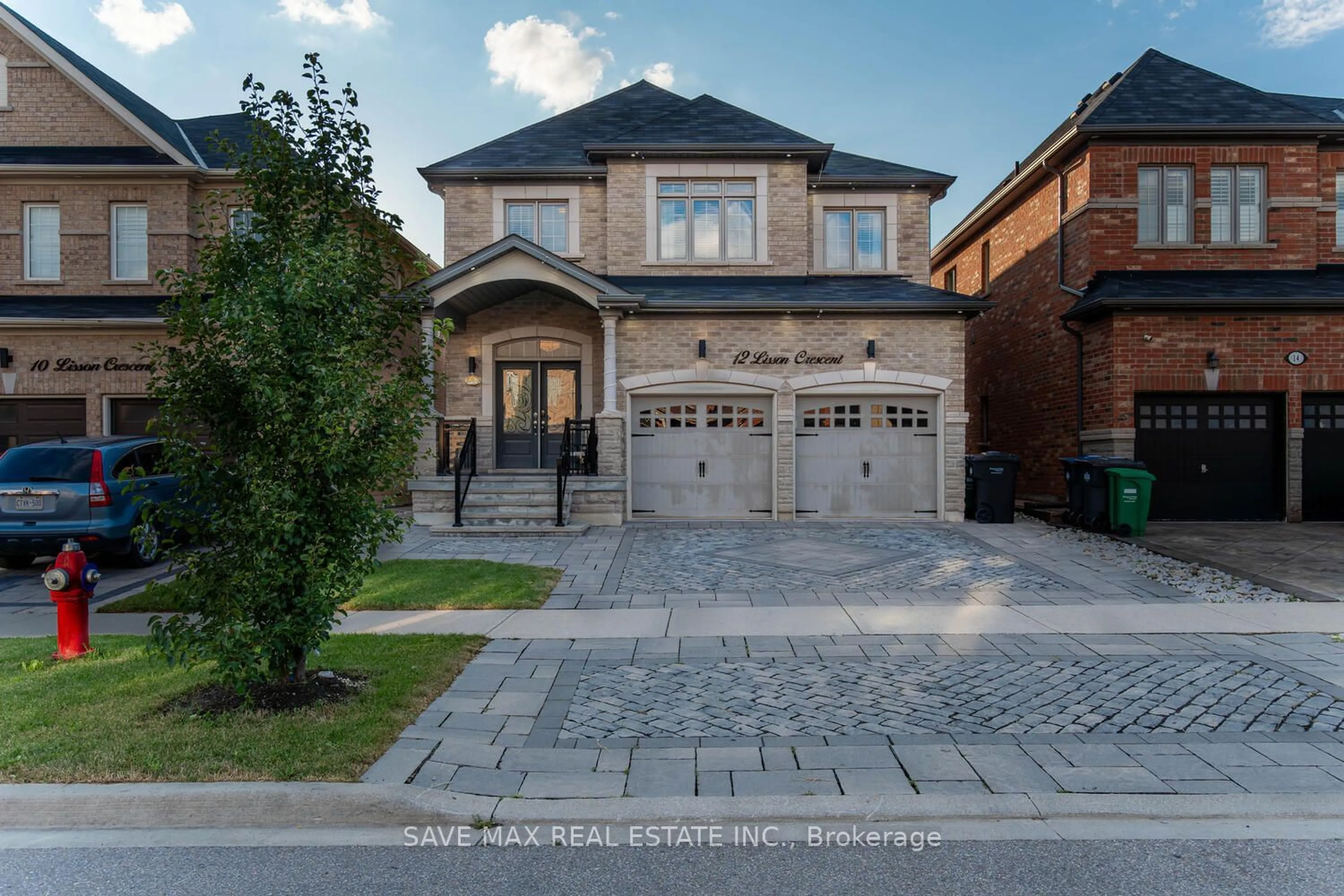 Home with brick exterior material for 12 Lisson Cres, Brampton Ontario L6X 5H9