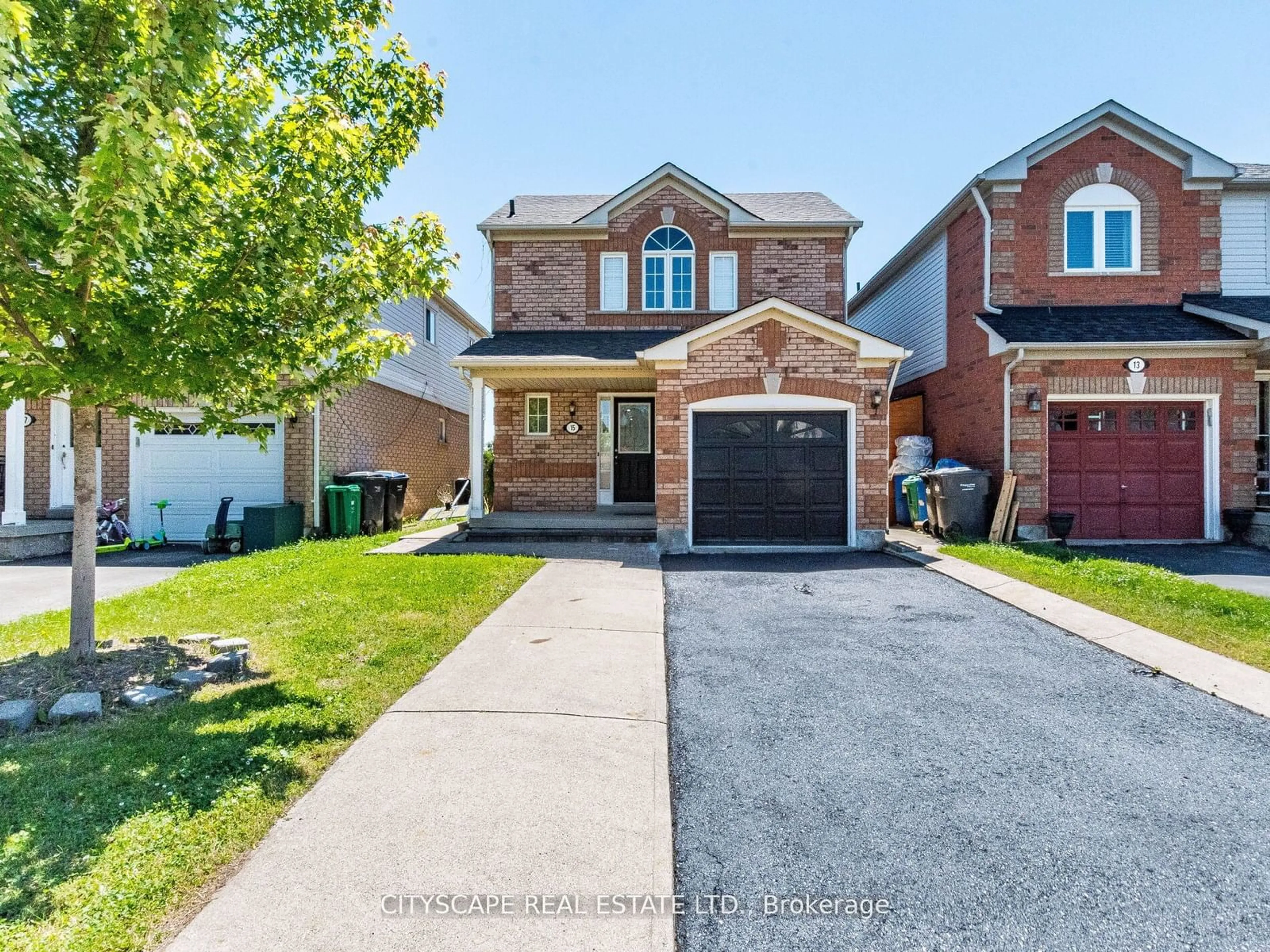 Frontside or backside of a home for 15 Woodhaven Dr, Brampton Ontario L7A 1Y6
