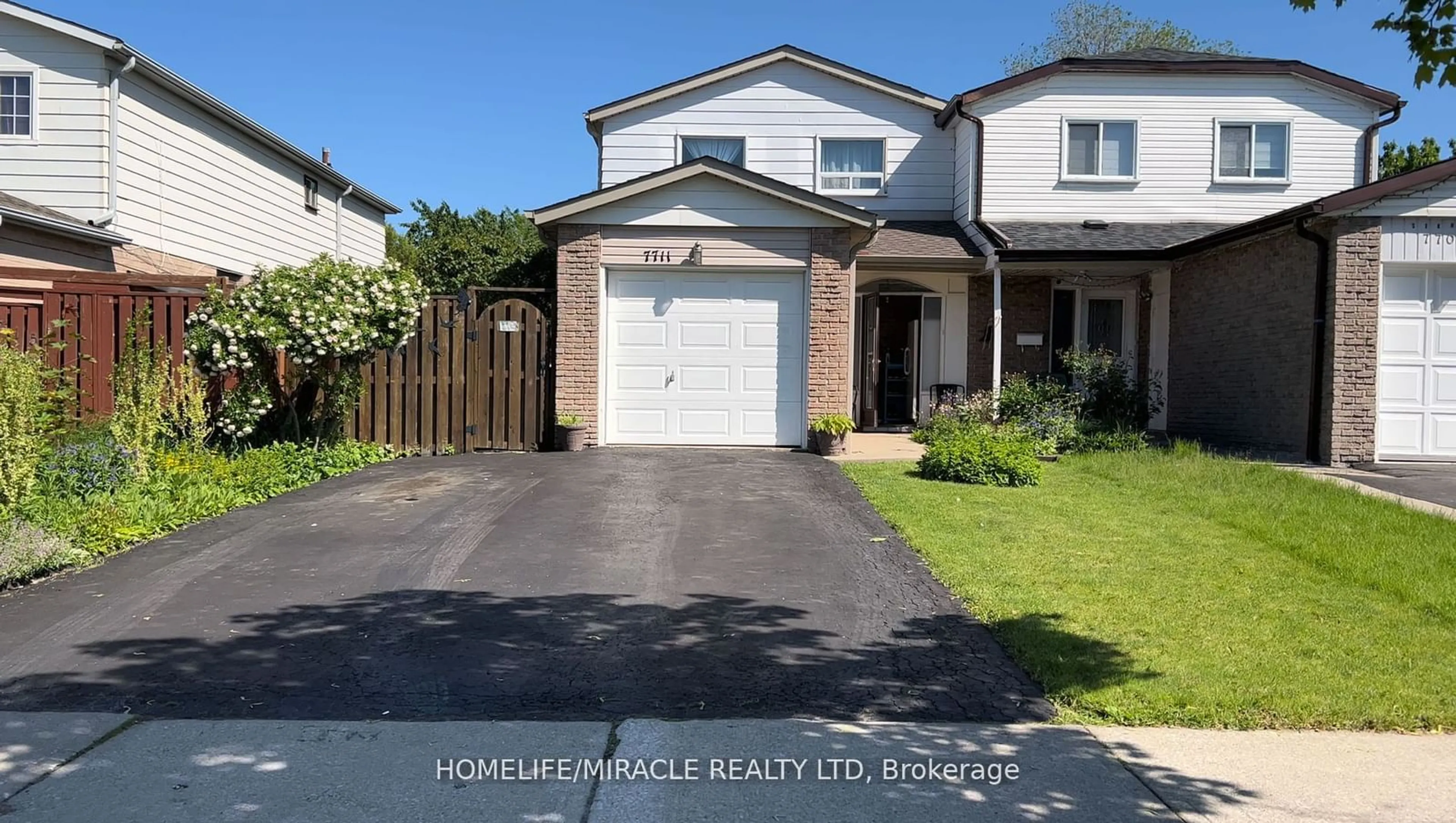 Frontside or backside of a home for 7711 BENAVON Rd, Mississauga Ontario L4T 3G5