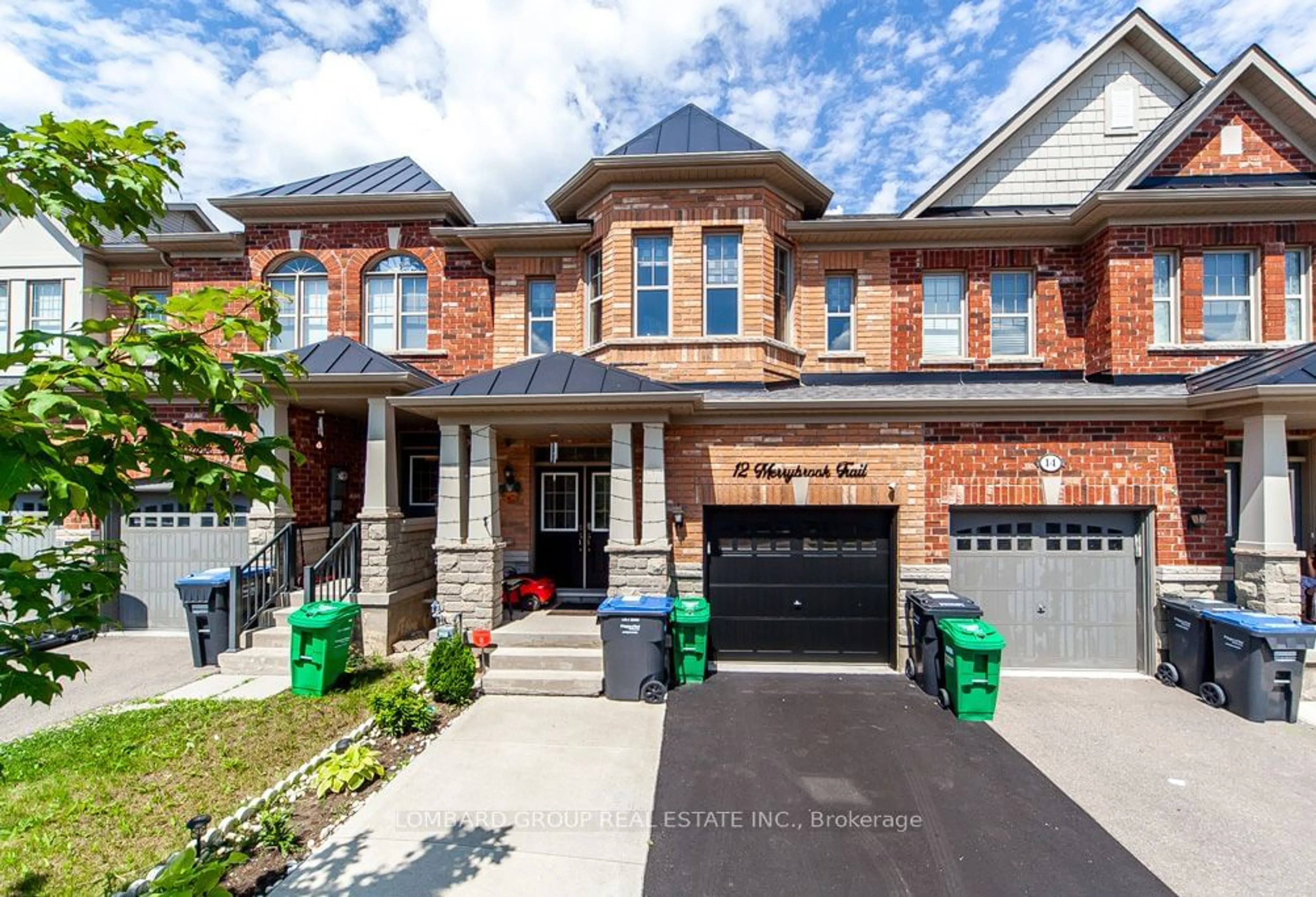 Home with brick exterior material for 12 Merrybrook Tr, Brampton Ontario L7A 4W1