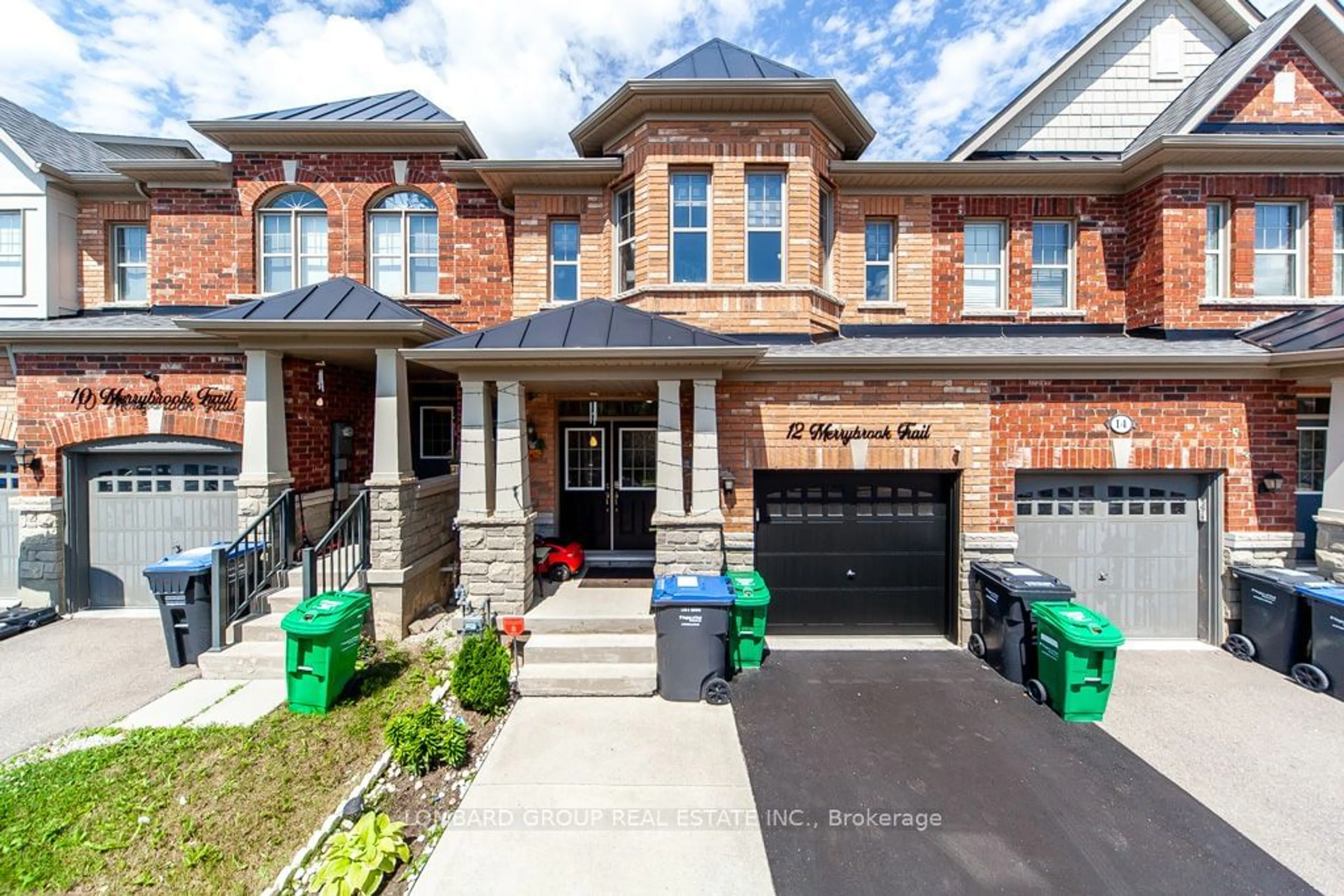 Home with brick exterior material for 12 Merrybrook Tr, Brampton Ontario L7A 4W1