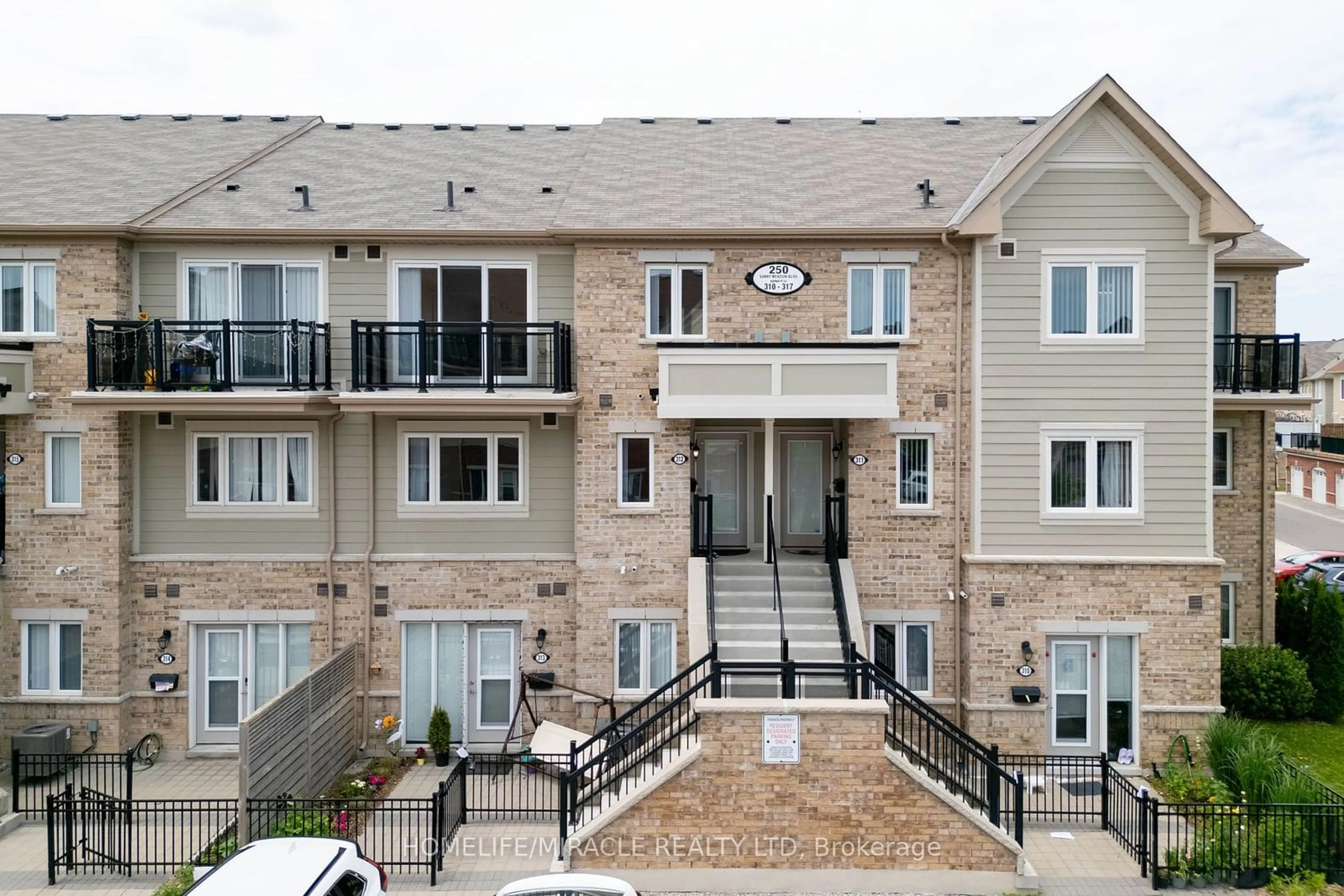 A pic from exterior of the house or condo for 250 Sunny Meadow Blvd #312, Brampton Ontario L6R 3Y7