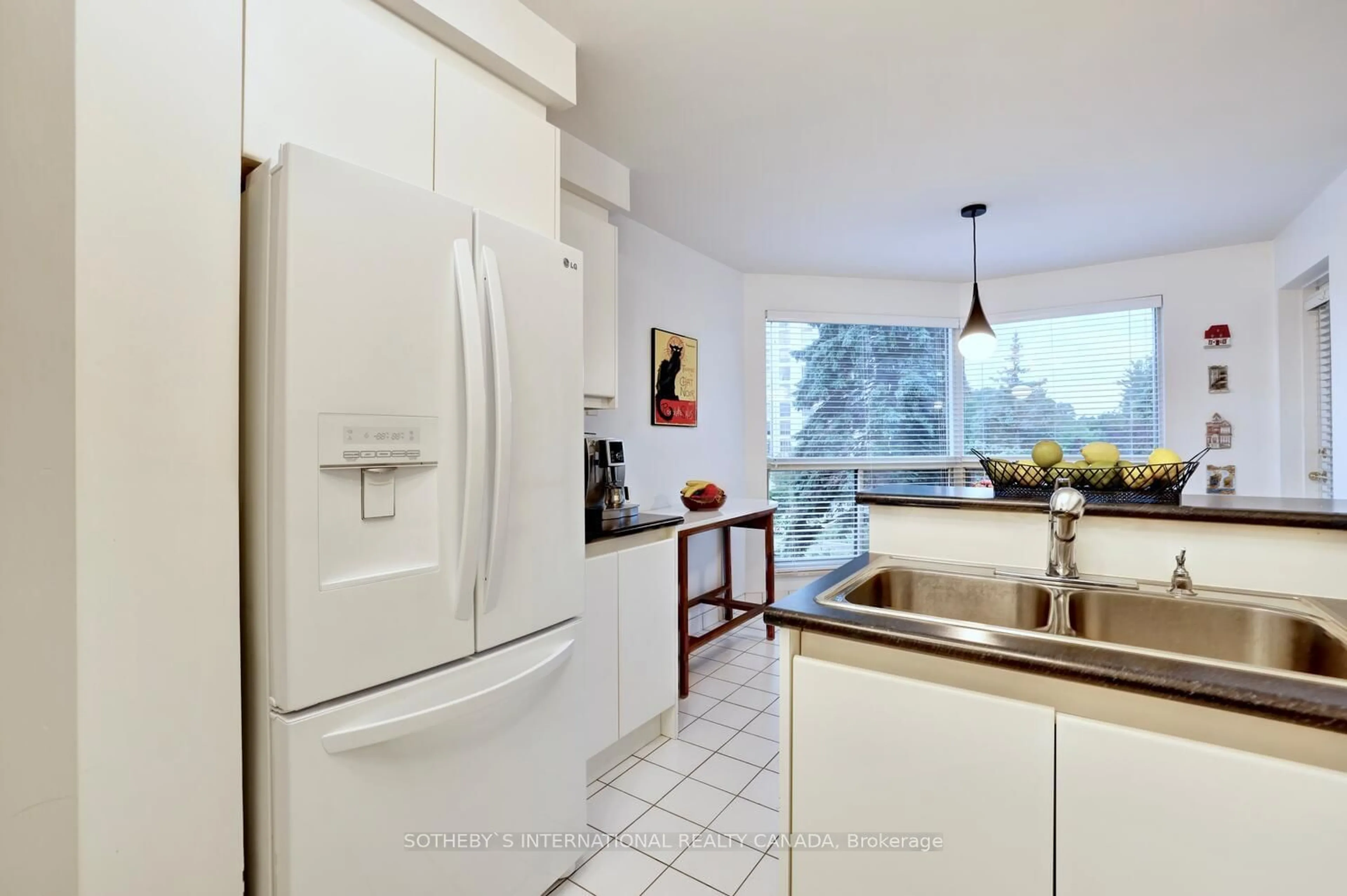 Kitchen with laundary machines for 1800 The Collegeway #203, Mississauga Ontario L5L 5S4