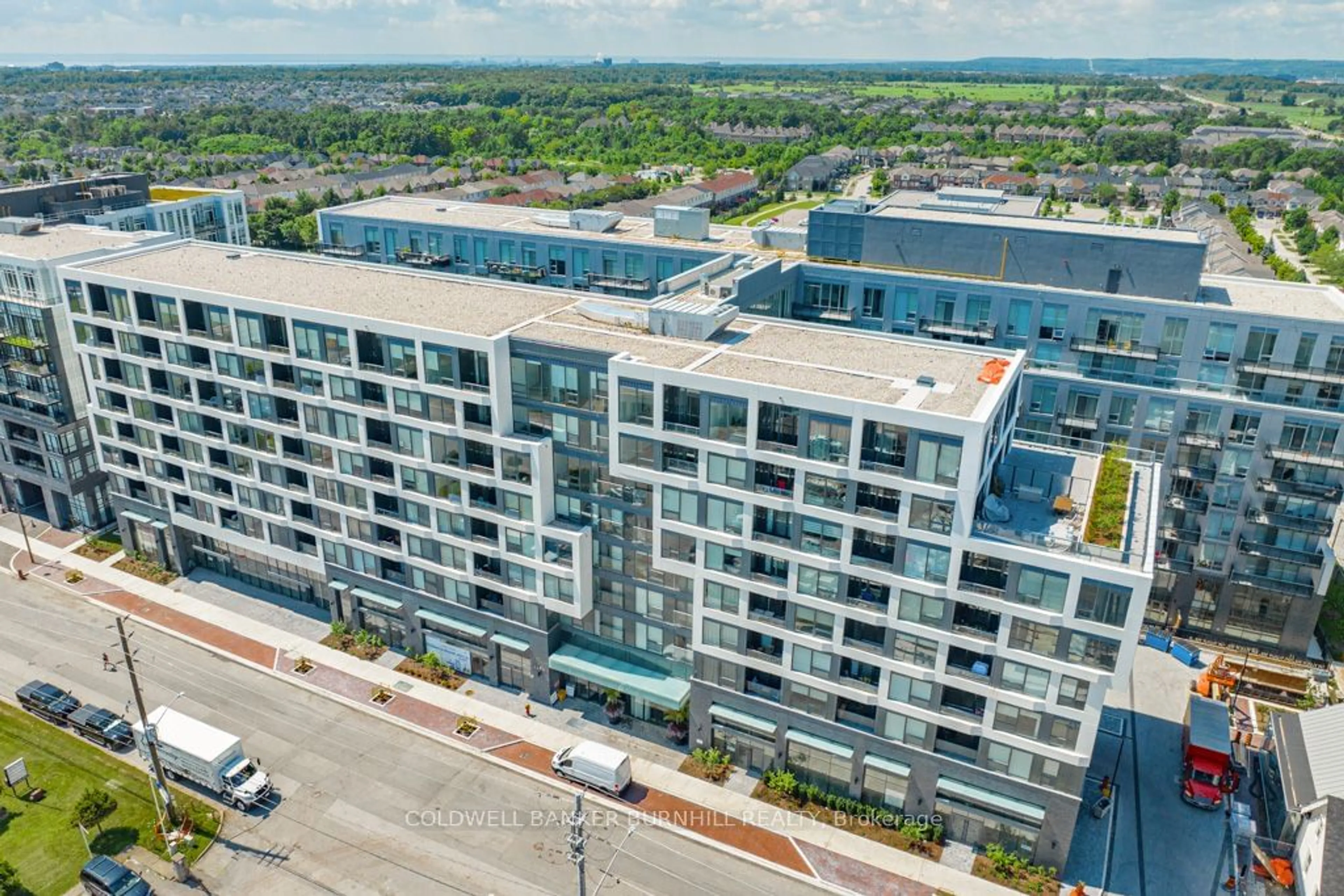 A pic from exterior of the house or condo, the front or back of building for 2450 Old Bronte Rd #213, Oakville Ontario L6M 4J2
