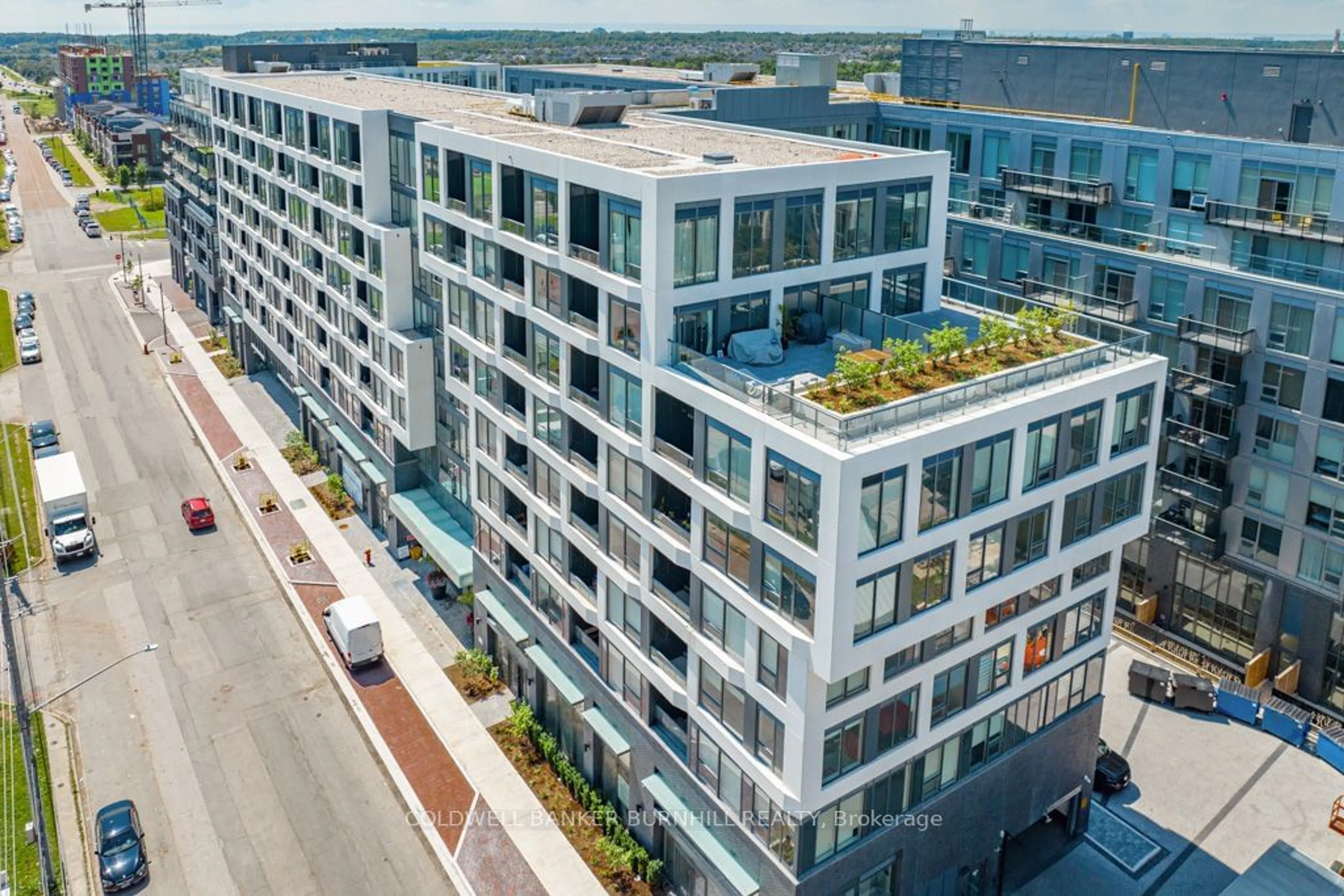A pic from exterior of the house or condo, the front or back of building for 2450 Old Bronte Rd #213, Oakville Ontario L6M 4J2