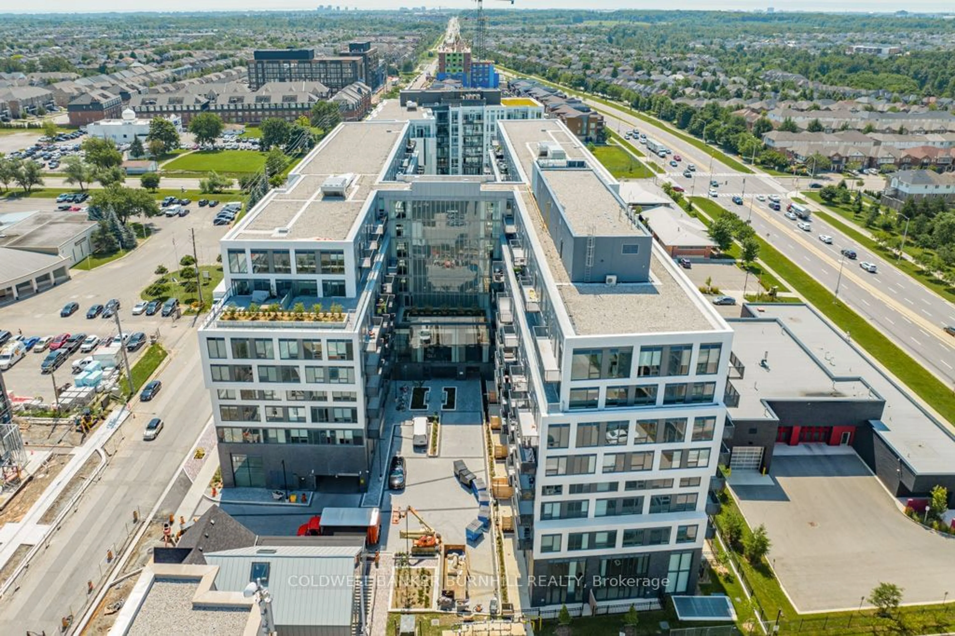 A pic from exterior of the house or condo, the view of city buildings for 2450 Old Bronte Rd #213, Oakville Ontario L6M 4J2