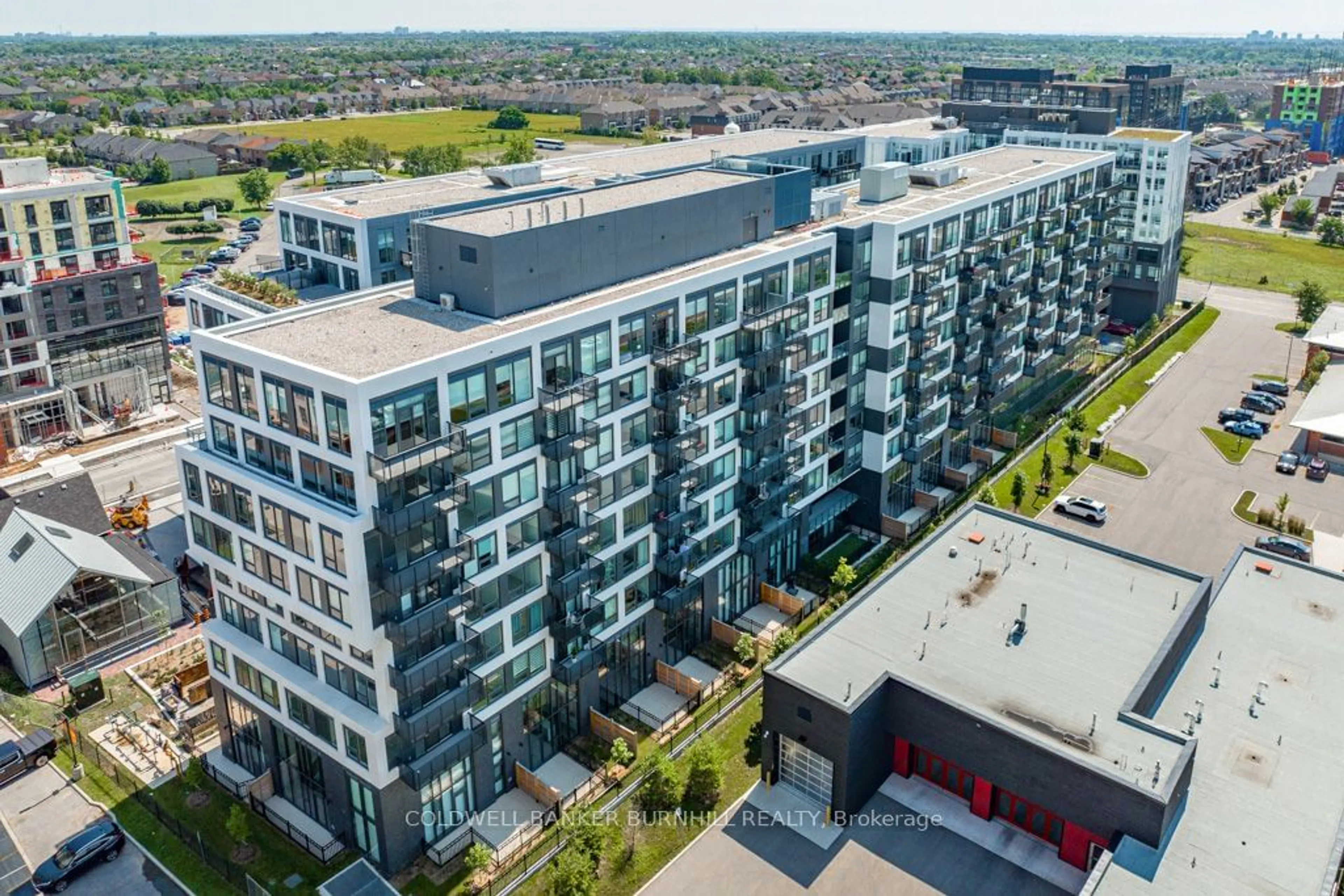 A pic from exterior of the house or condo, the front or back of building for 2450 Old Bronte Rd #213, Oakville Ontario L6M 4J2