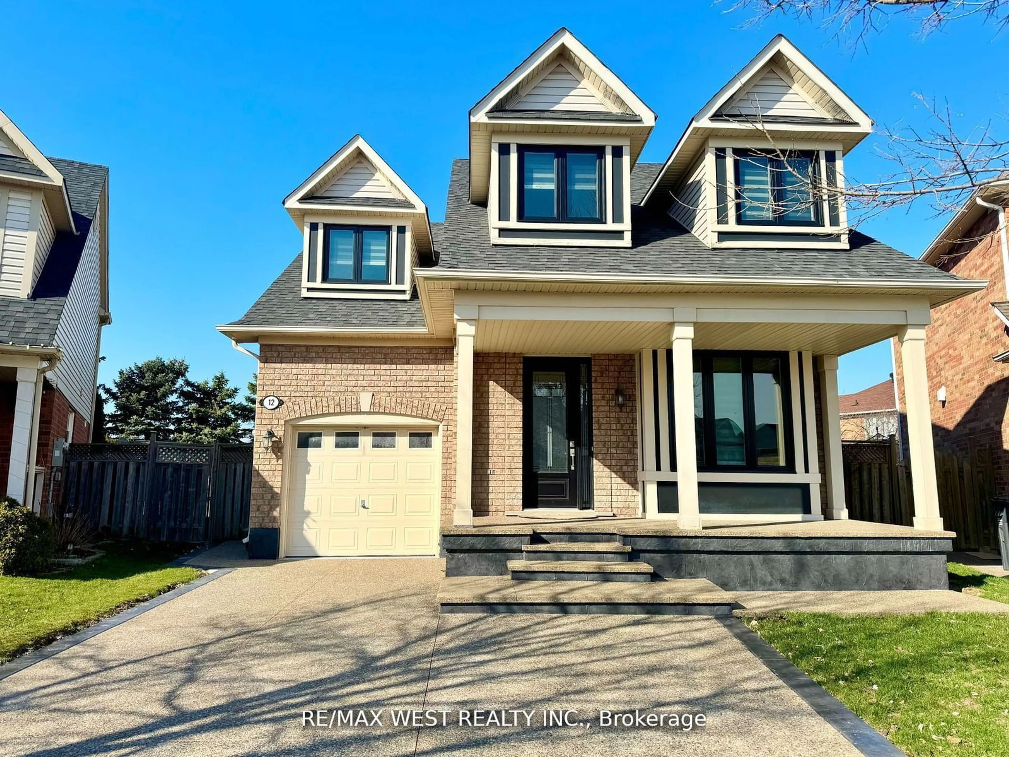 Home with brick exterior material for 12 Patience Dr, Brampton Ontario L7A 2S6