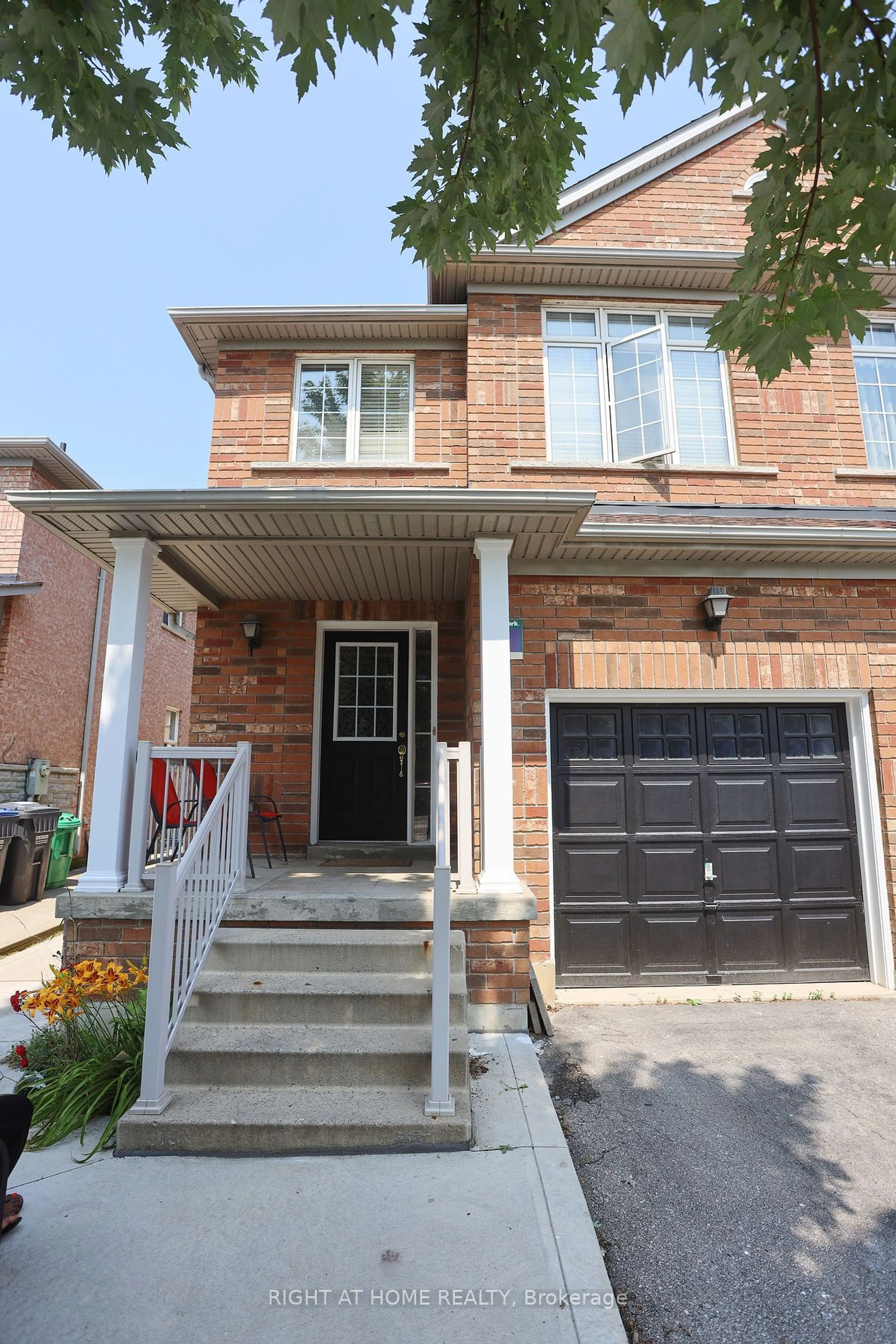 Home with brick exterior material for 165 Zia Dodda Cres, Brampton Ontario L6P 1T2