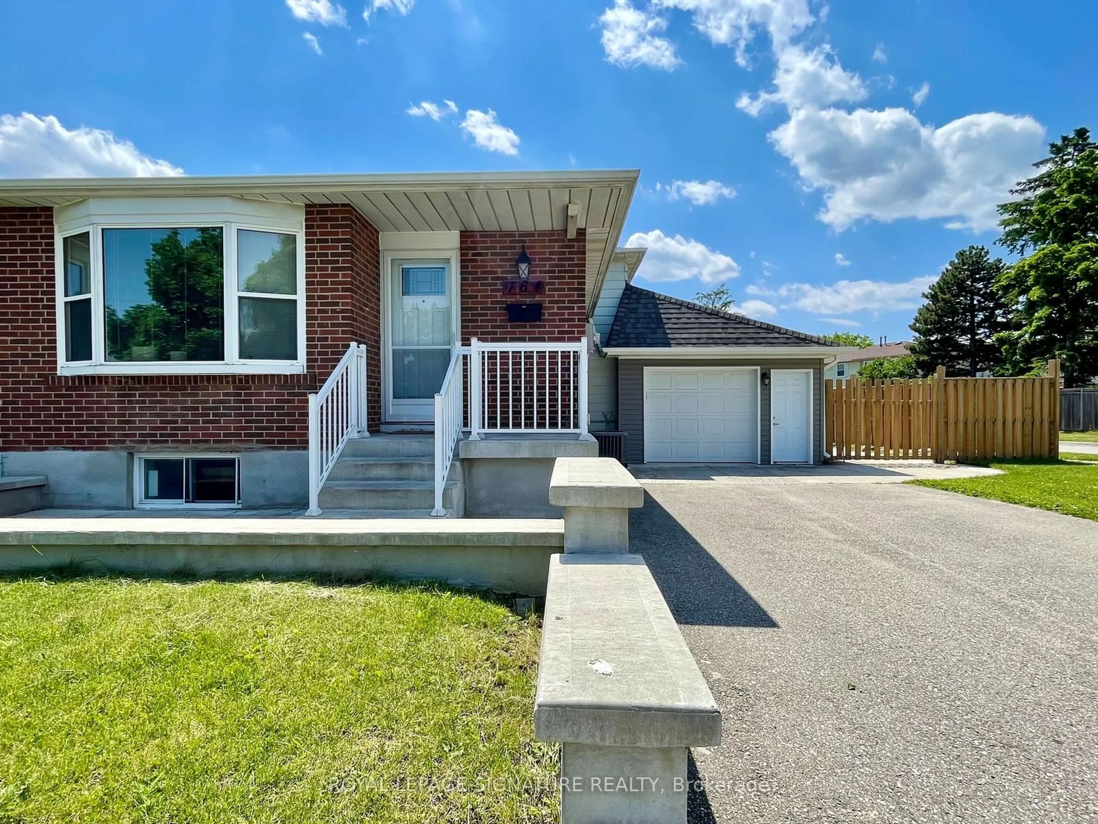 Home with brick exterior material for 164 Archdekin Dr, Brampton Ontario L6V 1Y7