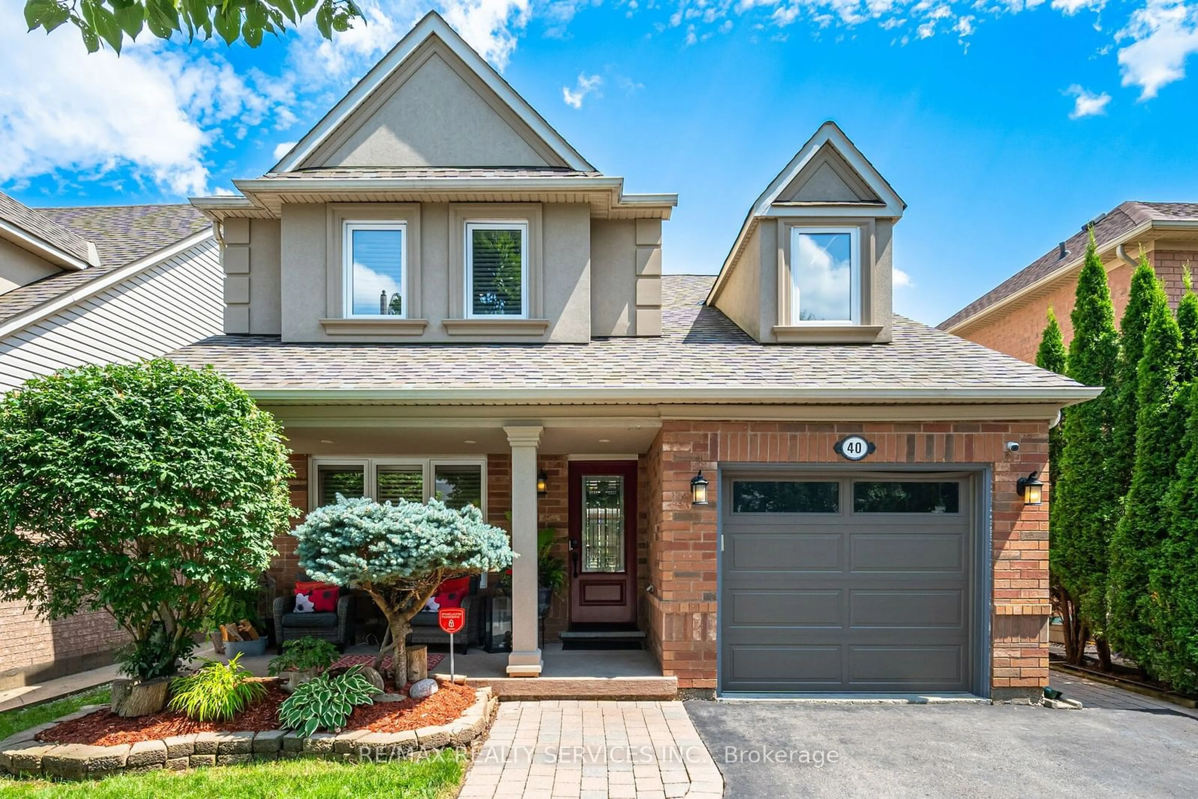 Home with brick exterior material for 40 Thorpe Cres, Brampton Ontario L7A 1P7