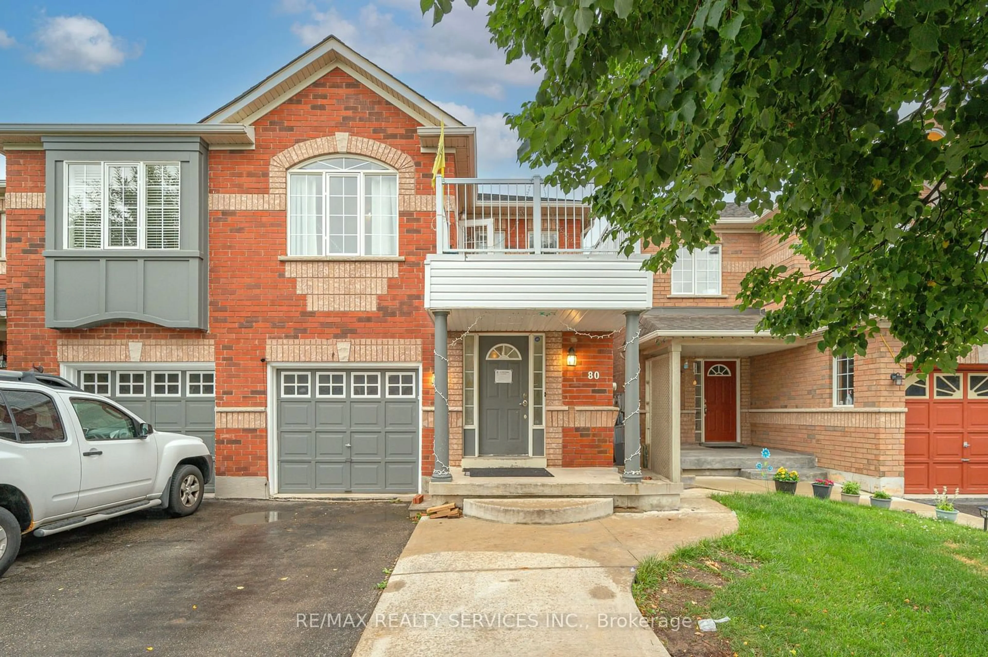 Home with brick exterior material for 80 Winners Circ, Brampton Ontario L7A 1W2