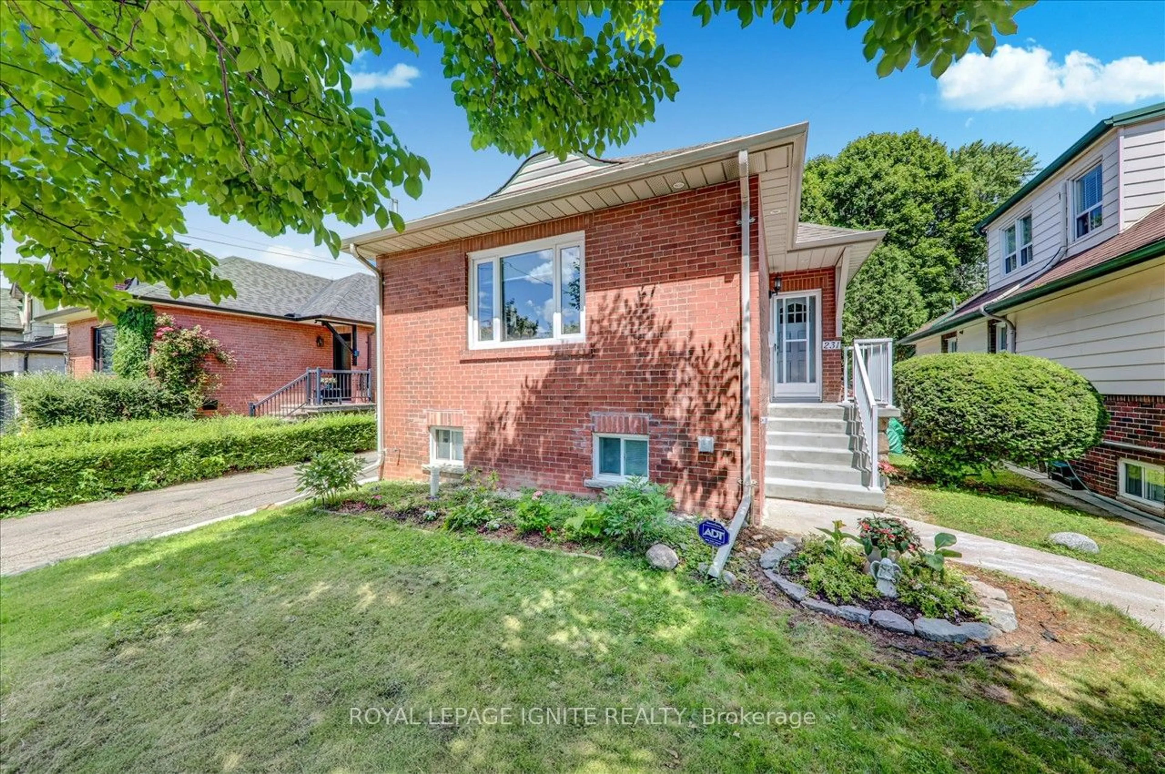 Home with brick exterior material for 231 Rosemount Ave, Toronto Ontario M9N 3C5