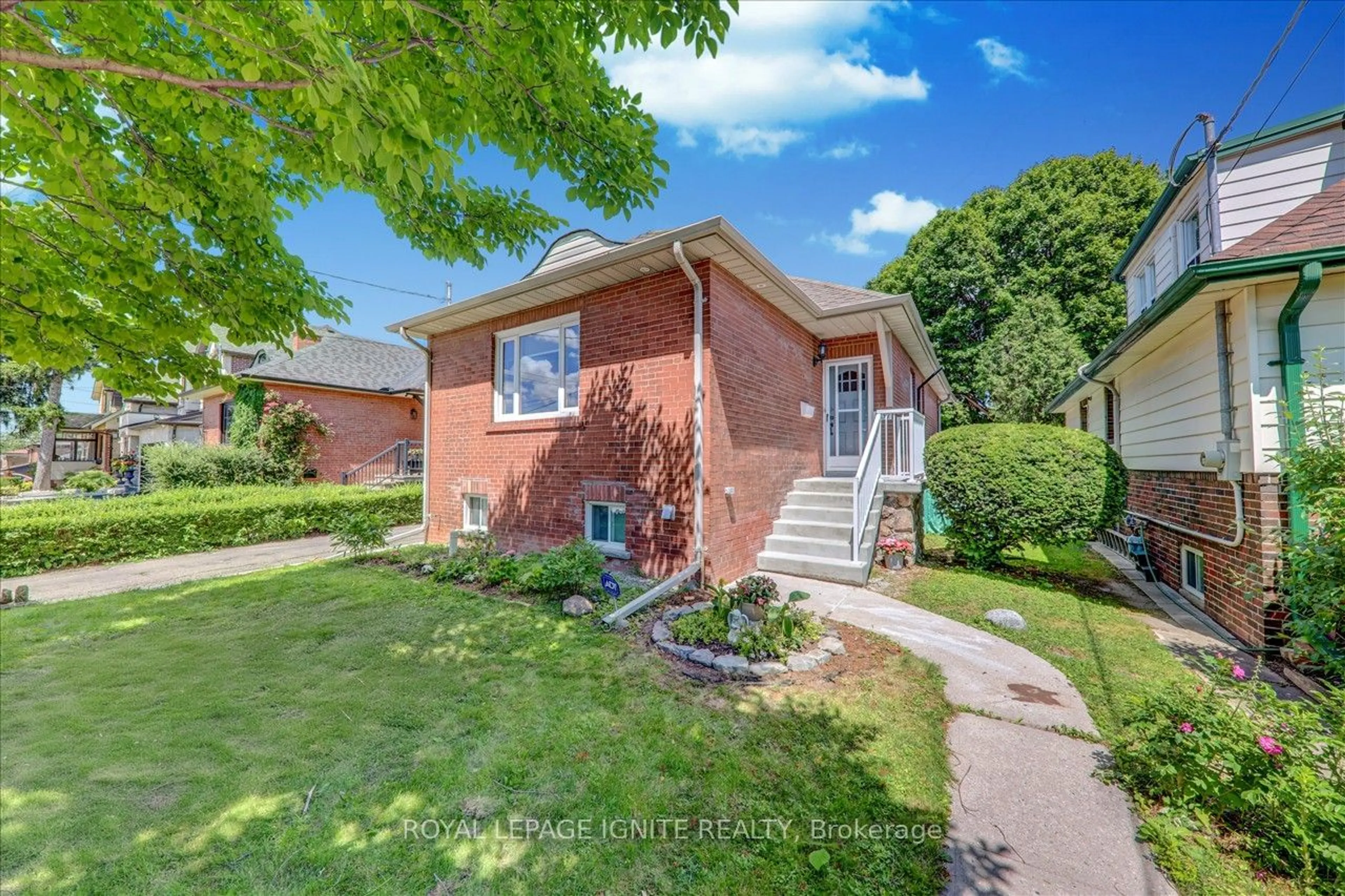 Frontside or backside of a home for 231 Rosemount Ave, Toronto Ontario M9N 3C5