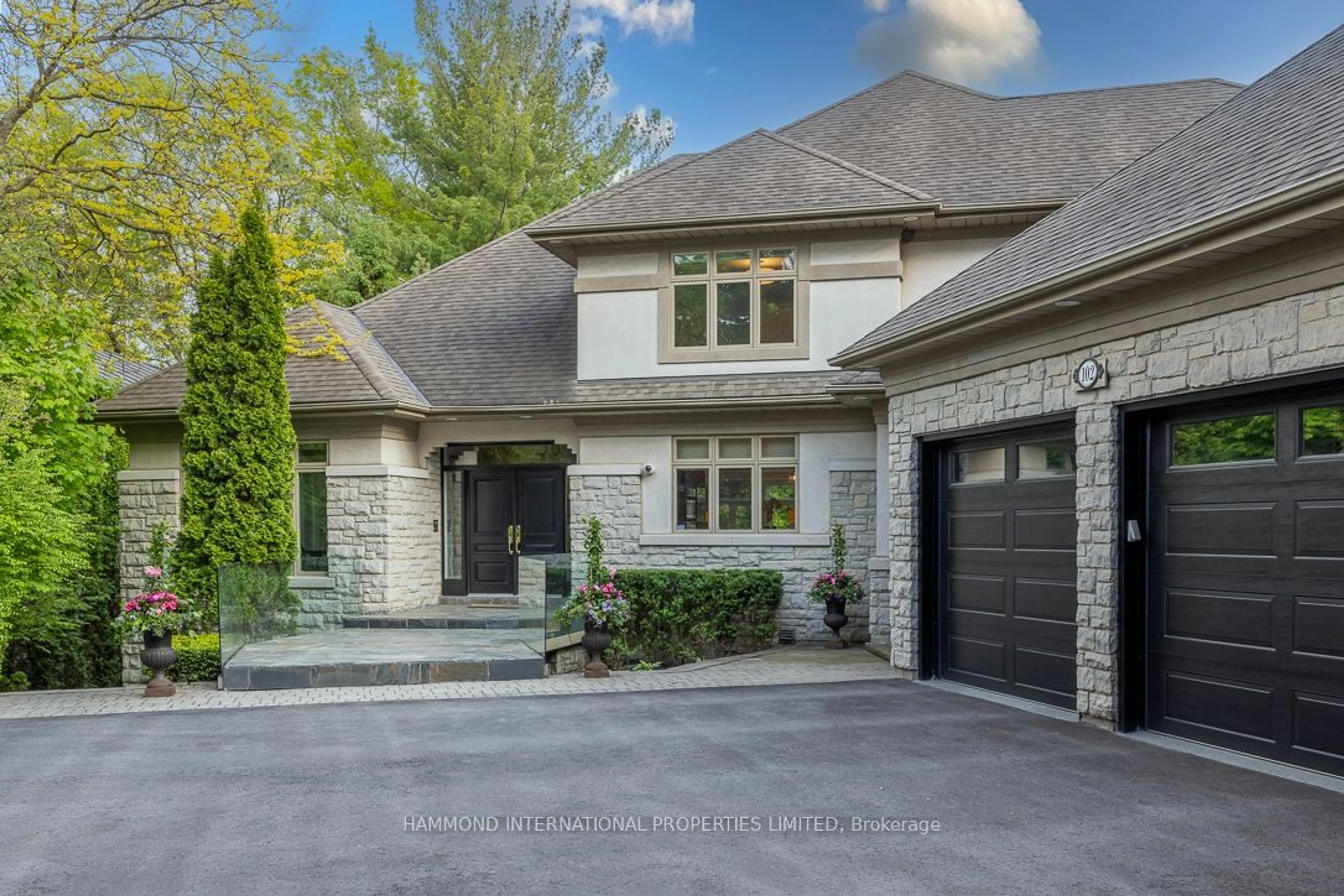 Home with brick exterior material for 102 North Dr, Toronto Ontario M9A 4R2