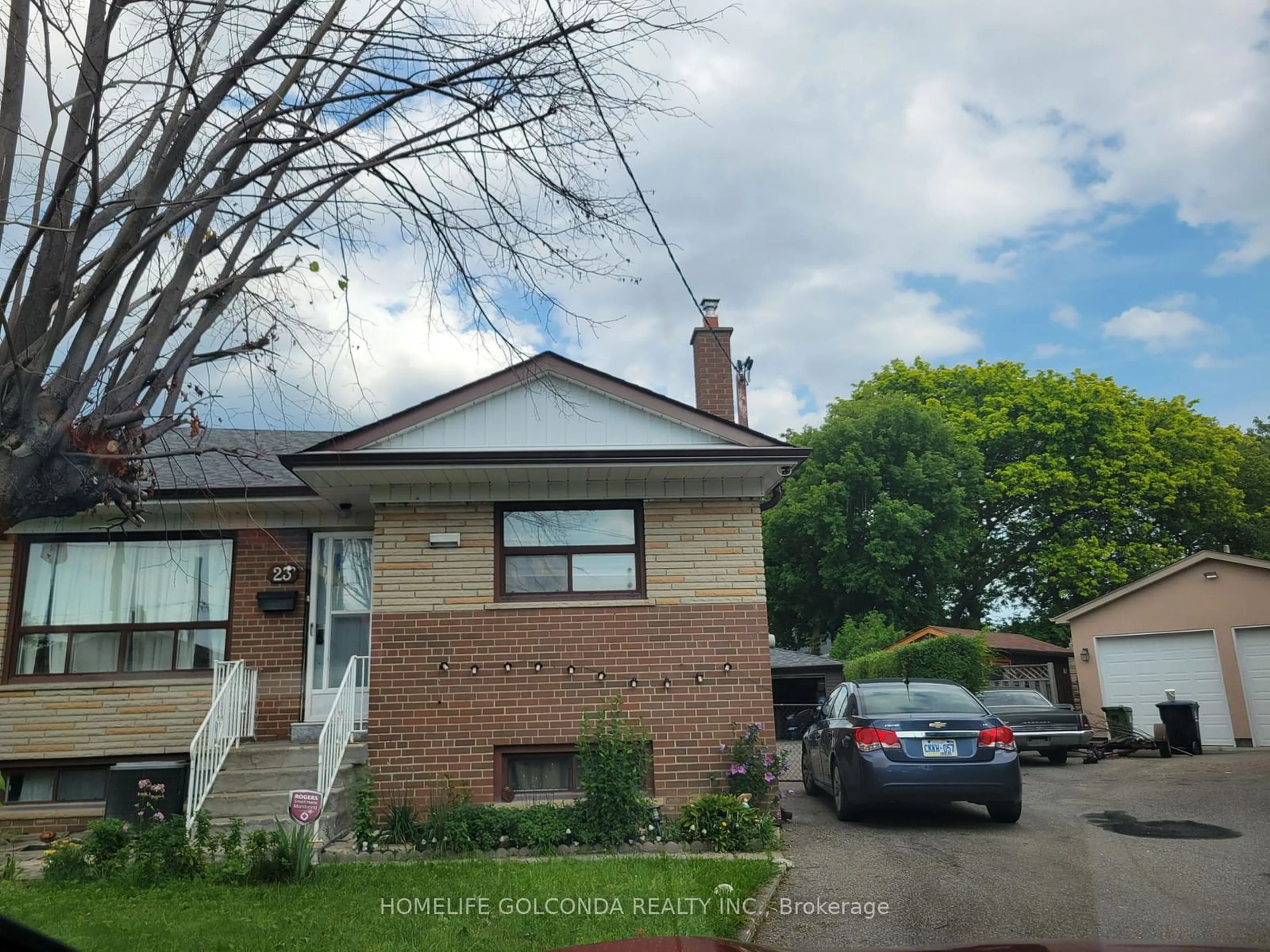 Frontside or backside of a home for 23 Rambler Pl, Toronto Ontario M3L 1N6