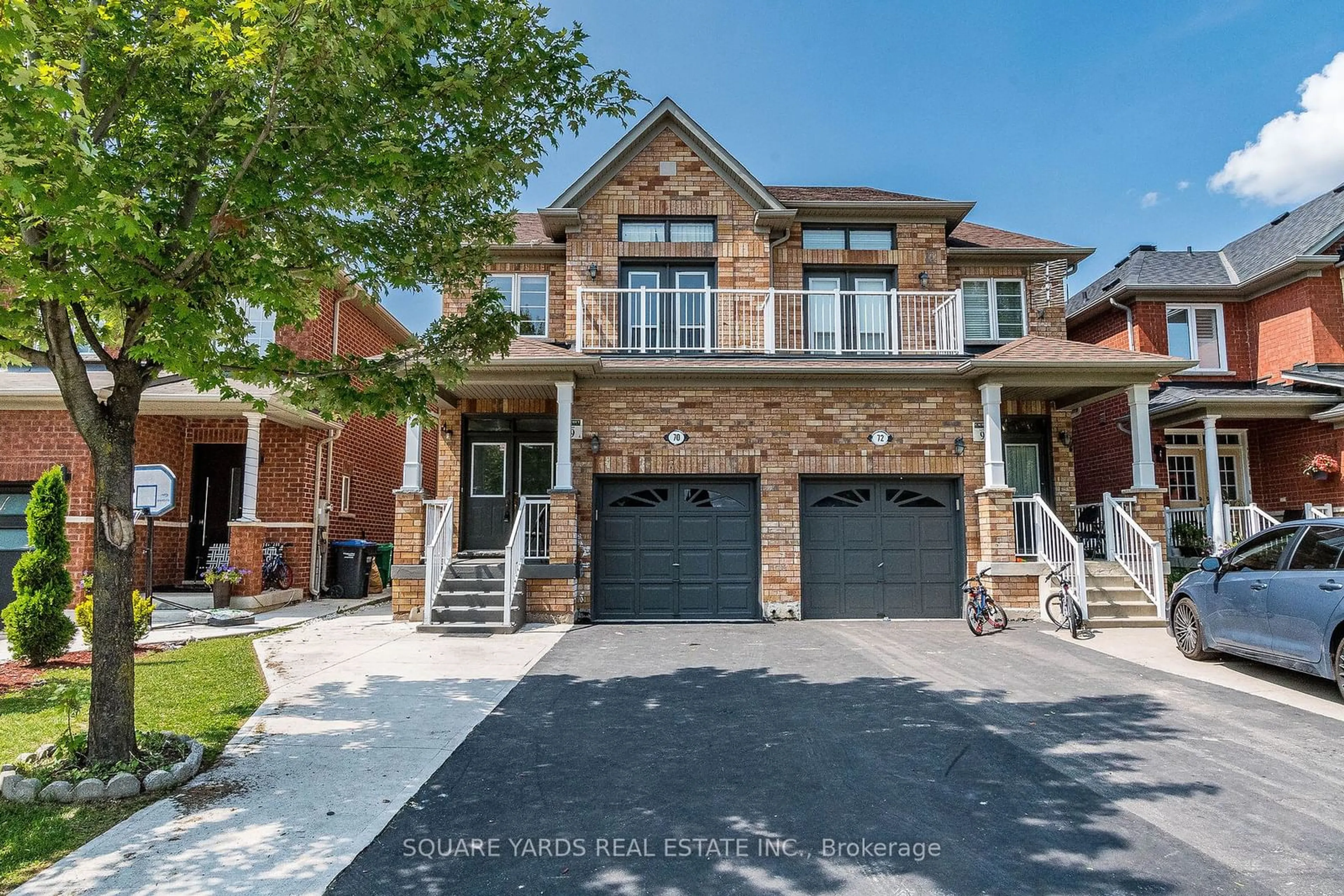 Home with brick exterior material for 70 Rubysilver Dr, Brampton Ontario L6P 1R1