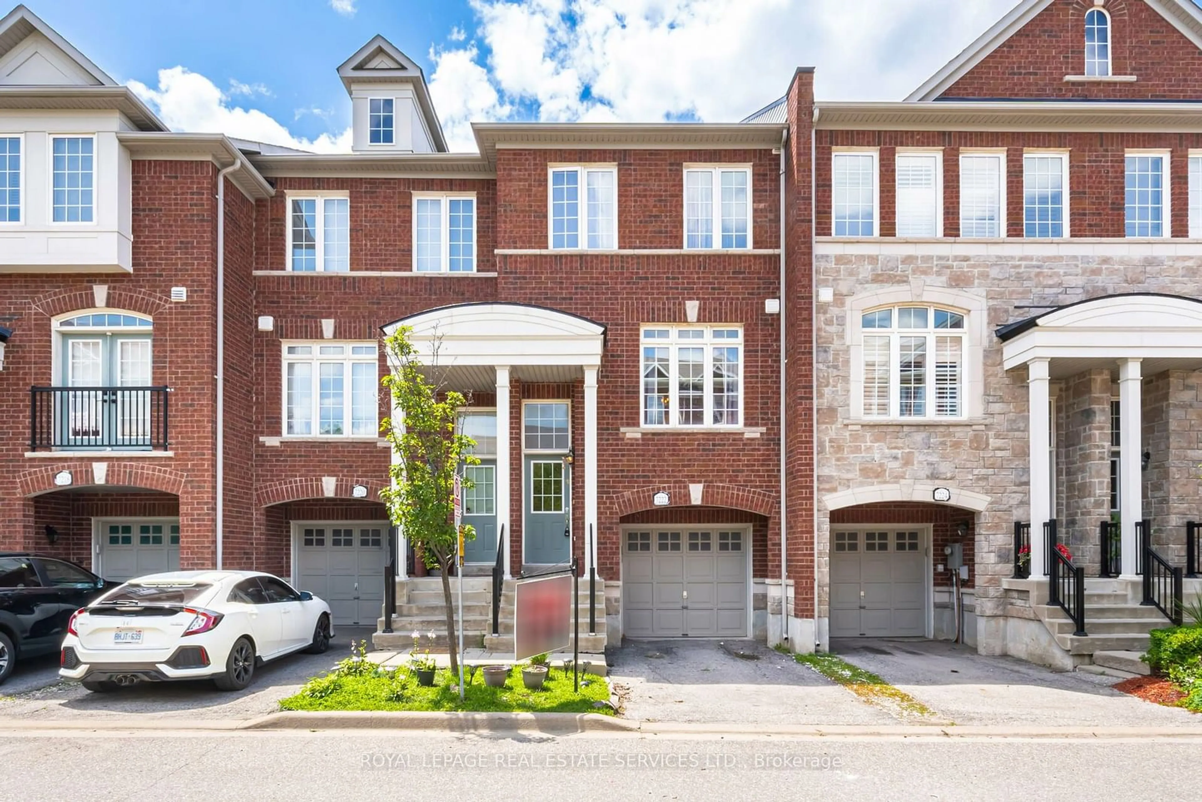 Home with brick exterior material for 7222 Triumph Lane #69, Mississauga Ontario L5N 0C5